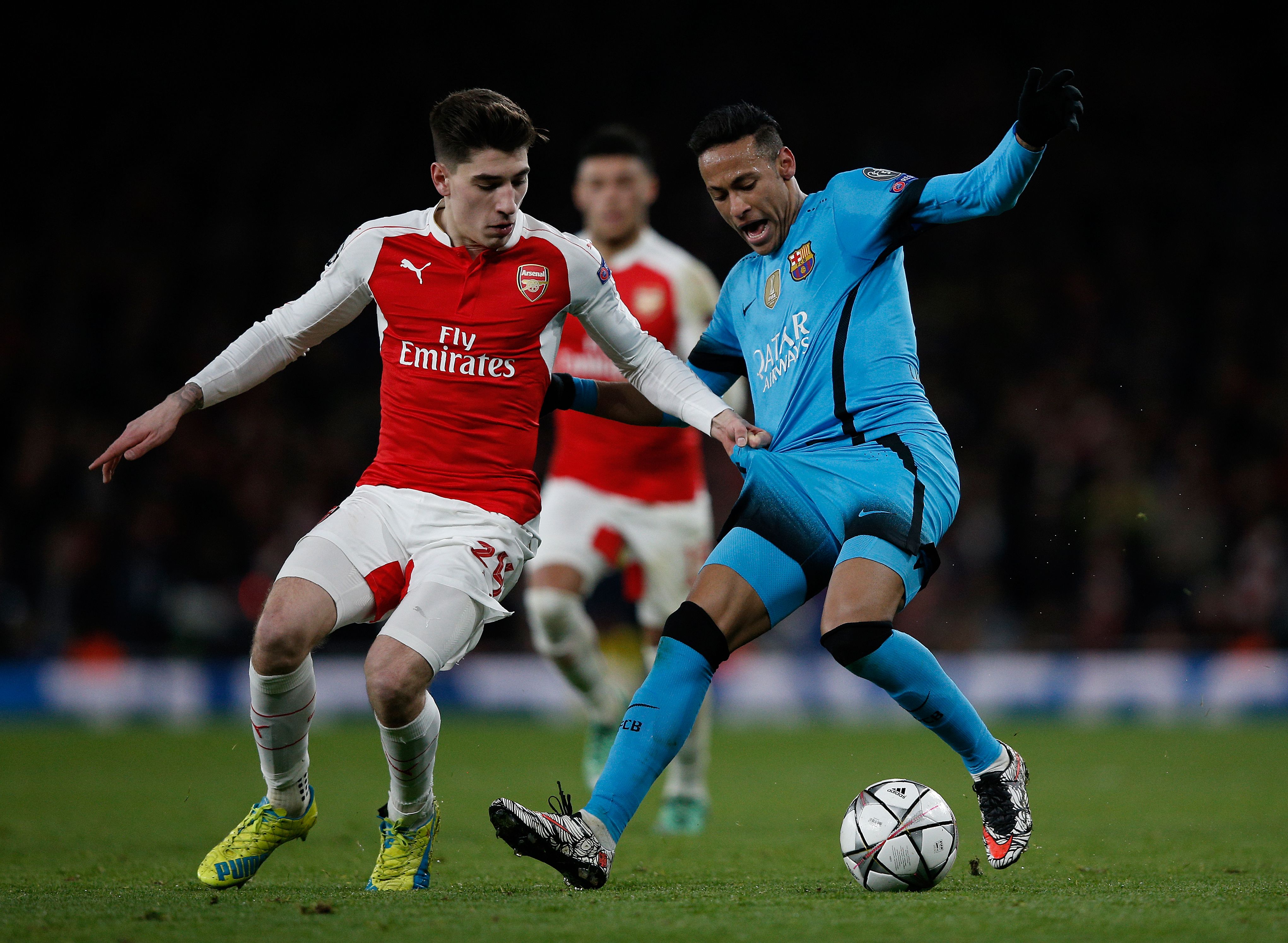 Arsenal's Spanish defender Hector Bellerin (L) vies with Barcelona's Brazilian forward Neymar during the UEFA Champions League round of 16 1st leg football match between Arsenal and Barcelona at the Emirates Stadium in London on February 23, 2016. 
 / AFP / ADRIAN DENNIS        (Photo credit should read ADRIAN DENNIS/AFP/Getty Images)