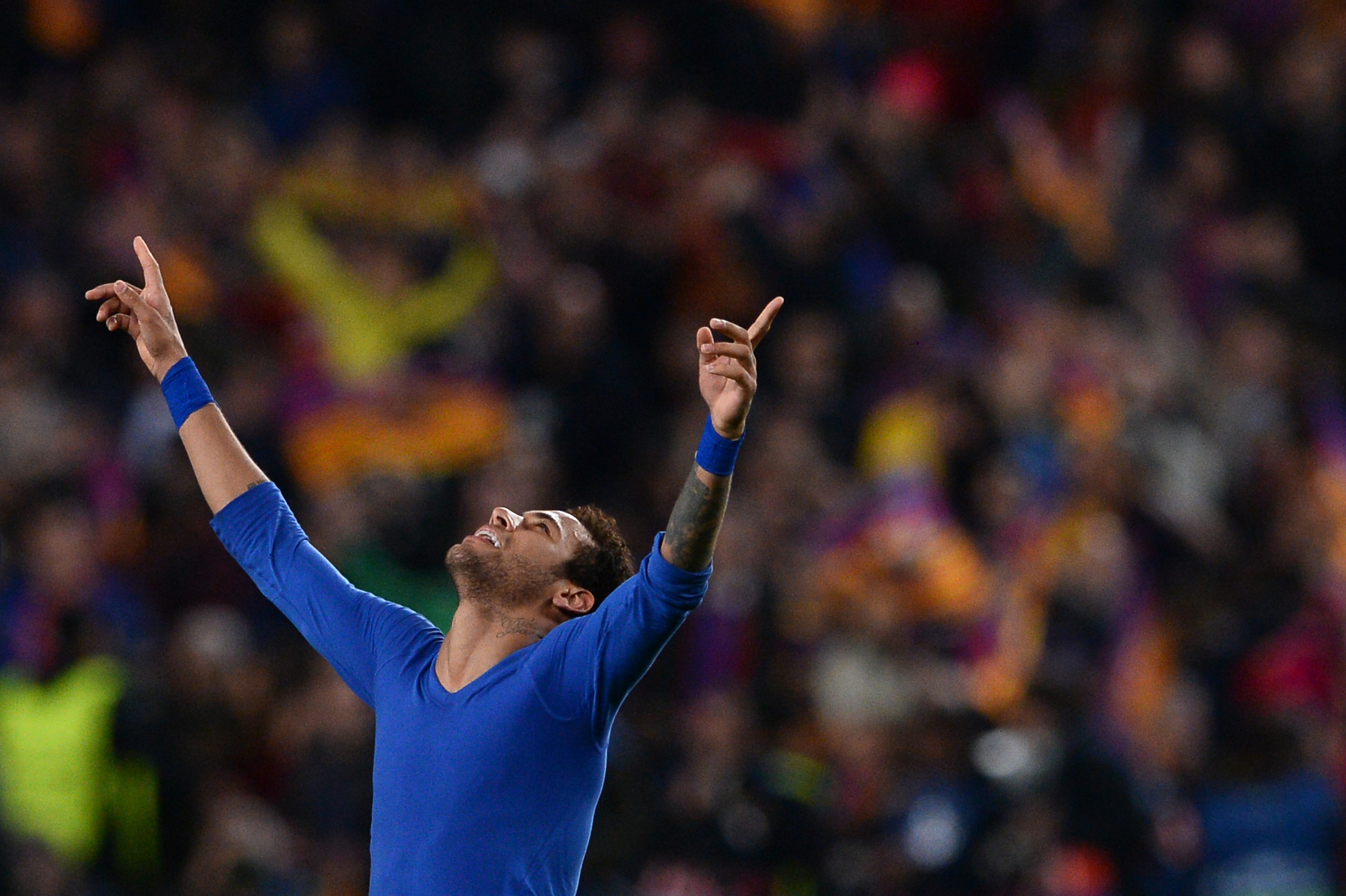 Barcelona's Brazilian forward Neymar celebrates their 6-1 victory at the end of the UEFA Champions League round of 16 second leg football match FC Barcelona vs Paris Saint-Germain FC at the Camp Nou stadium in Barcelona on March 8, 2017. / AFP PHOTO / Josep Lago        (Photo credit should read JOSEP LAGO/AFP/Getty Images)