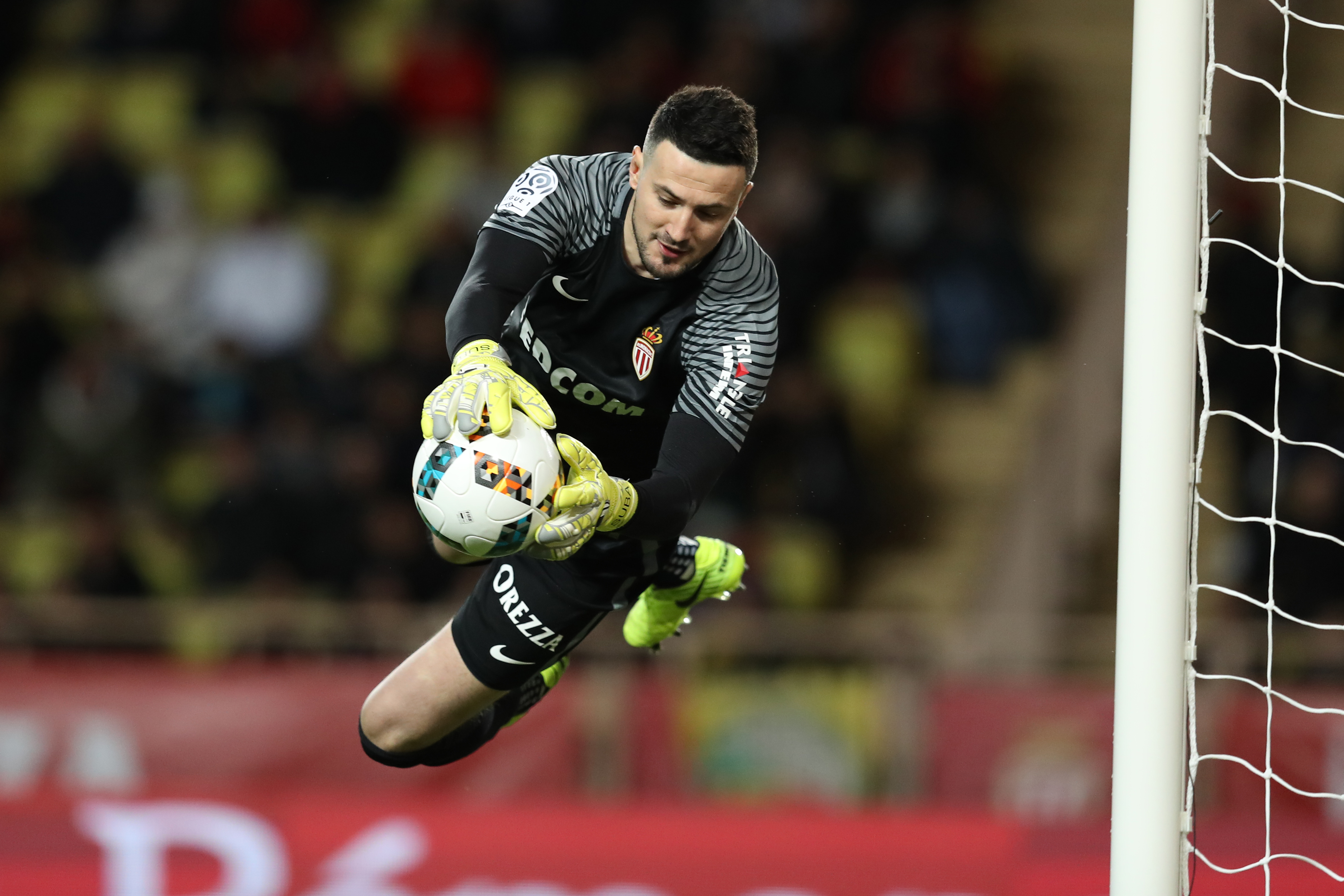 Monaco's Croatian goalkeeper Danijel Subasic makes a save during the French L1 football match Monaco (ASM) vs Nantes (FCN) on March 5, 2017 at the "Louis II Stadium" in Monaco.   / AFP PHOTO / VALERY HACHE        (Photo credit should read VALERY HACHE/AFP/Getty Images)