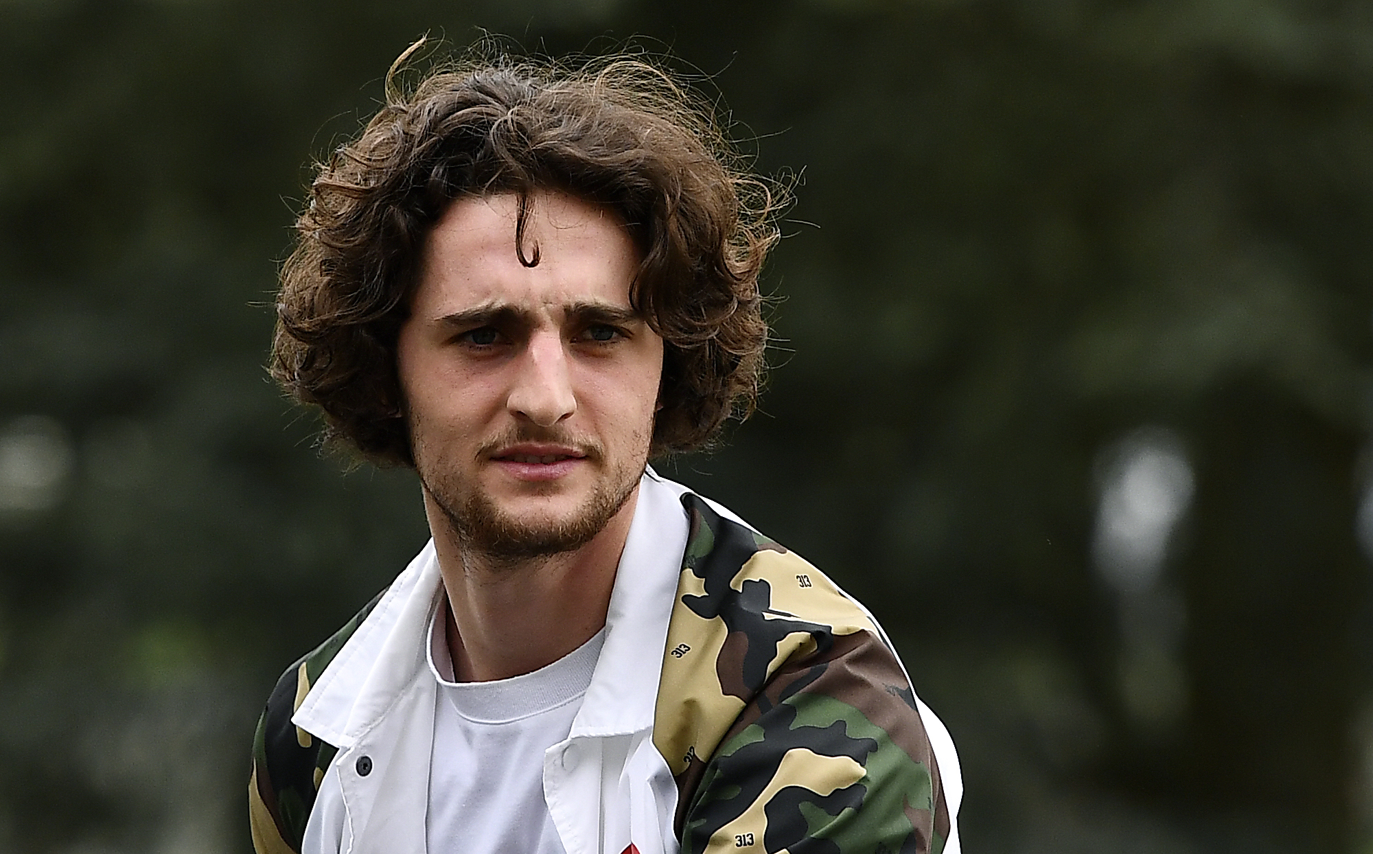 France's midfielder Adrien Rabiot arrives at the French national football team training base in Clairefontaine-en-Yvelines near Paris on March 20, 2017, as part of the team's preparation for the upcoming World Cup 2018 qualifiers.  / AFP PHOTO / FRANCK FIFE        (Photo credit should read FRANCK FIFE/AFP/Getty Images)