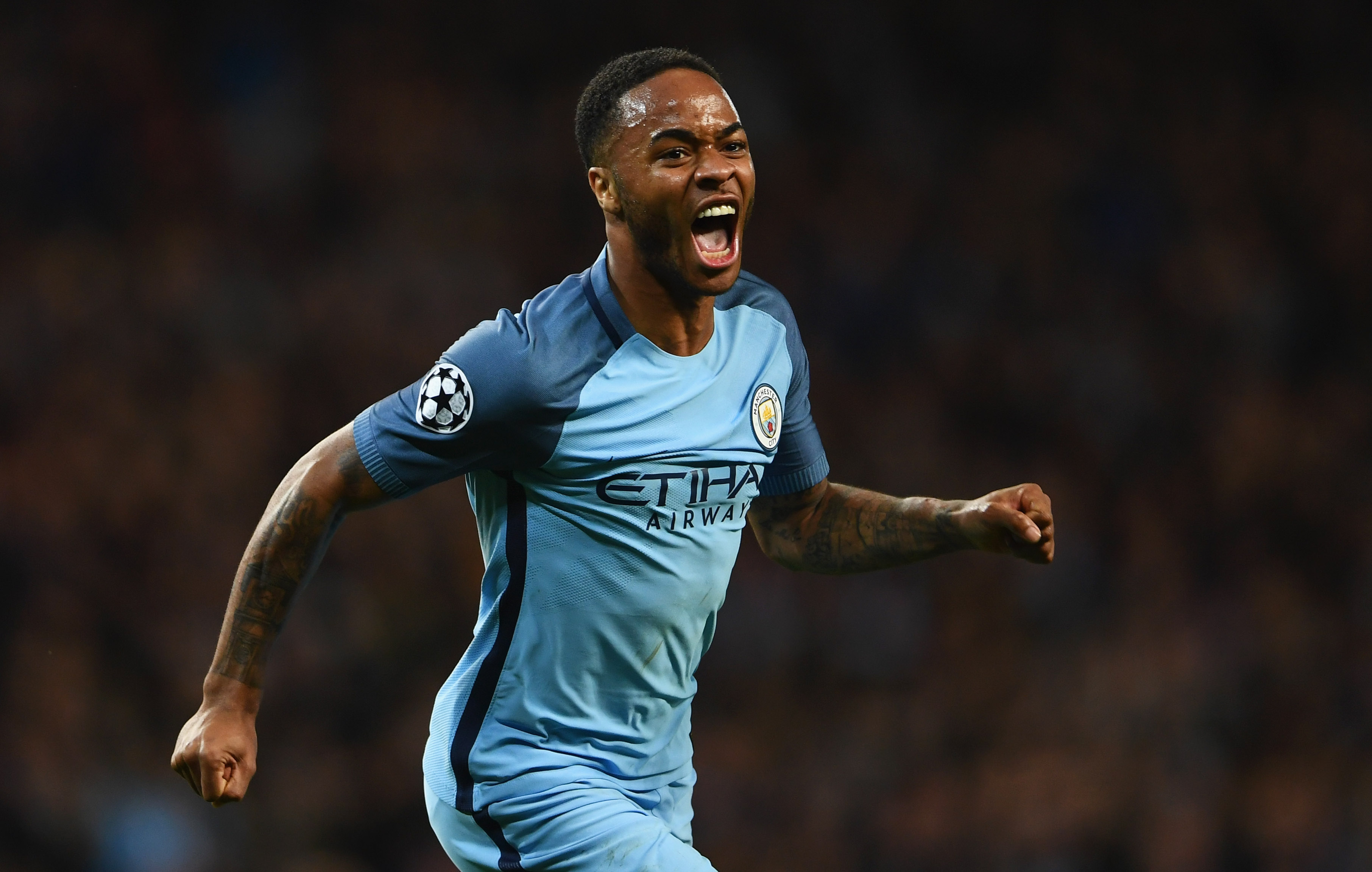 MANCHESTER, ENGLAND - FEBRUARY 21:  Raheem Sterling of Manchester City celebrates as he scores their first goal during the UEFA Champions League Round of 16 first leg match between Manchester City FC and AS Monaco at Etihad Stadium on February 21, 2017 in Manchester, United Kingdom.  (Photo by Laurence Griffiths/Getty Images)