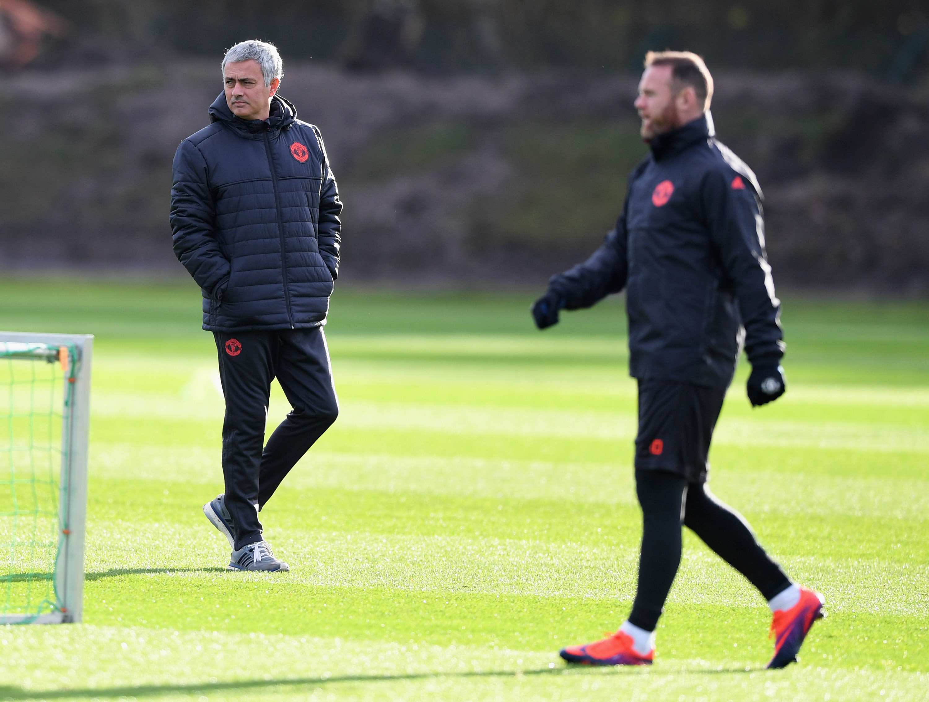 MANCHESTER, ENGLAND - NOVEMBER 23:  Jose Mourinho manager of Manchester United and Wayne Rooney look on during a Manchester United training session on the eve of their UEFA Europa League match against Feyenoord at Aon Training Complex on November 23, 2016 in Manchester, England.  (Photo by Gareth Copley/Getty Images)