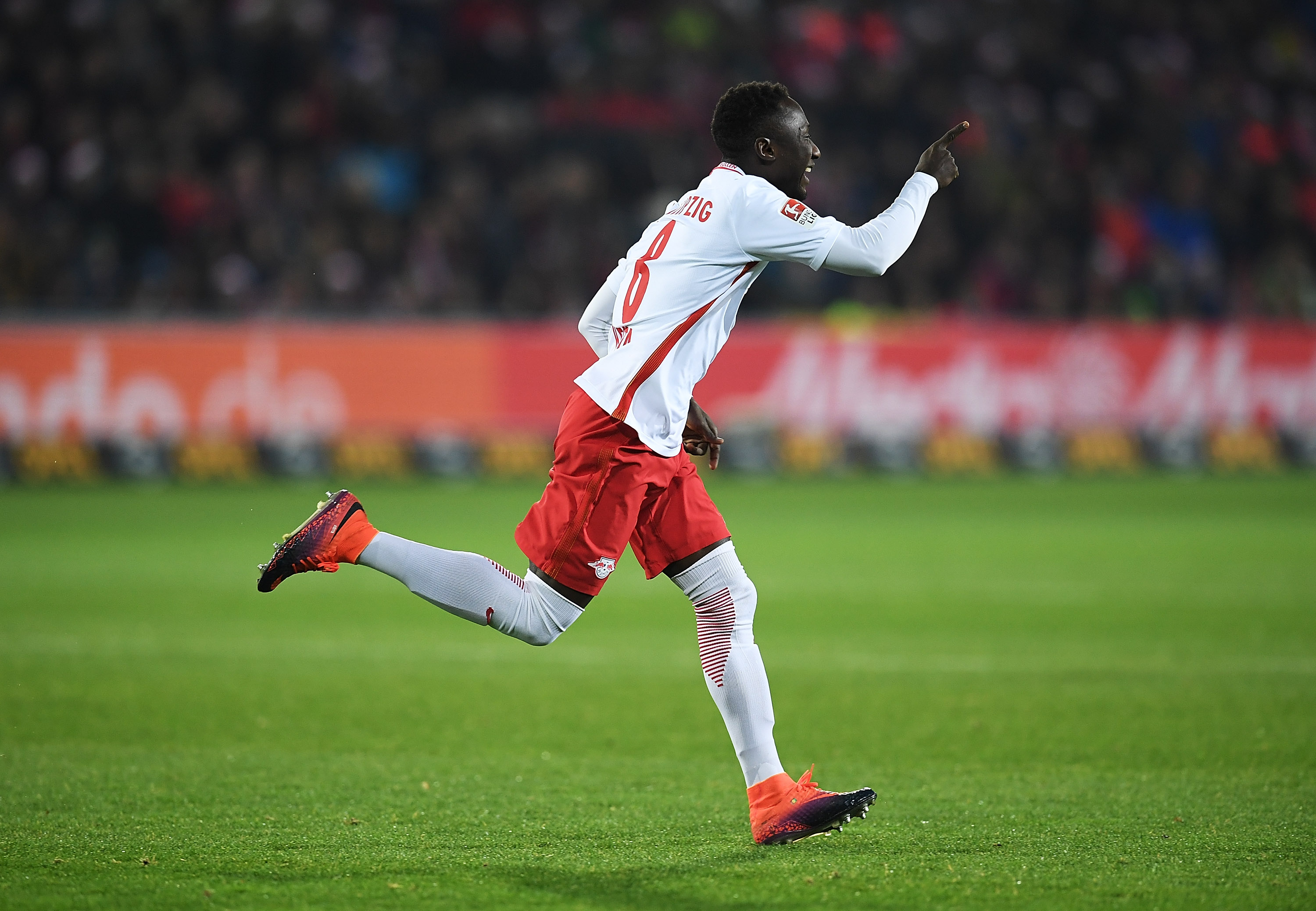 FREIBURG IM BREISGAU, GERMANY - NOVEMBER 25:  Naby Deco Keita of RB Leipzig celebrates after scoring the first goal during the Bundesliga match between SC Freiburg and RB Leipzig at Schwarzwald-Stadion on November 25, 2016 in Freiburg im Breisgau, Germany.  (Photo by Matthias Hangst/Bongarts/Getty Images)