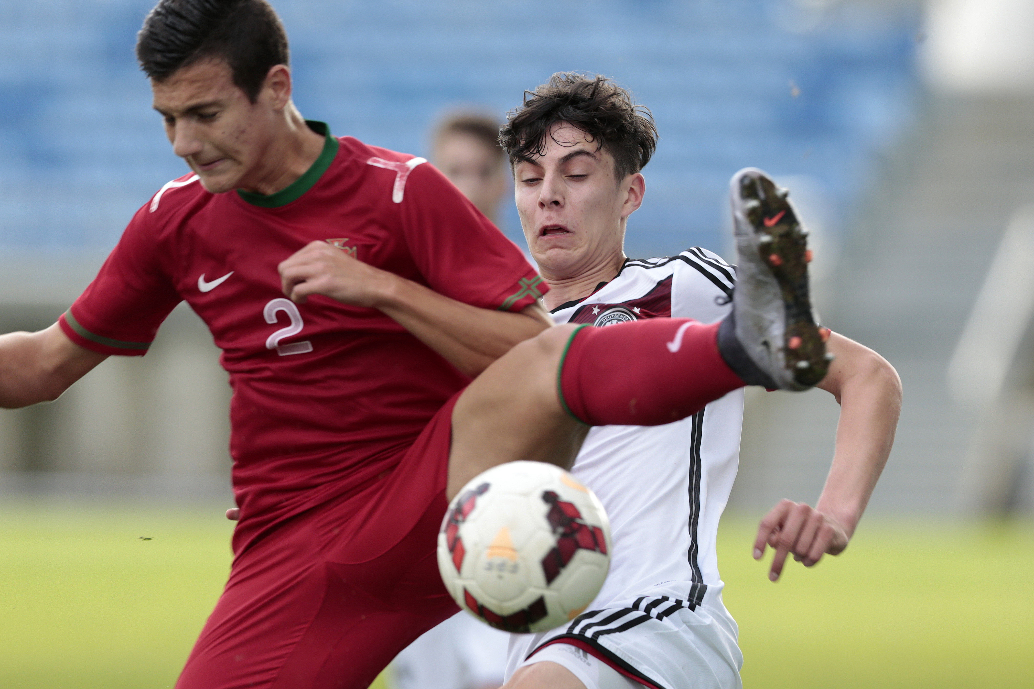 LOULÉ, PORTUGAL - FEBRUARY 9: Diogo Dalot of Portugal challenges Kai Havertz of Germany during the UEFA Under17 match between U17 Portugal v U17 Germany on February 9, 2016 in Estádio Algarve, Loulé, Portugal. (Photo by Filipe Farinha/Bongarts/Getty Images)