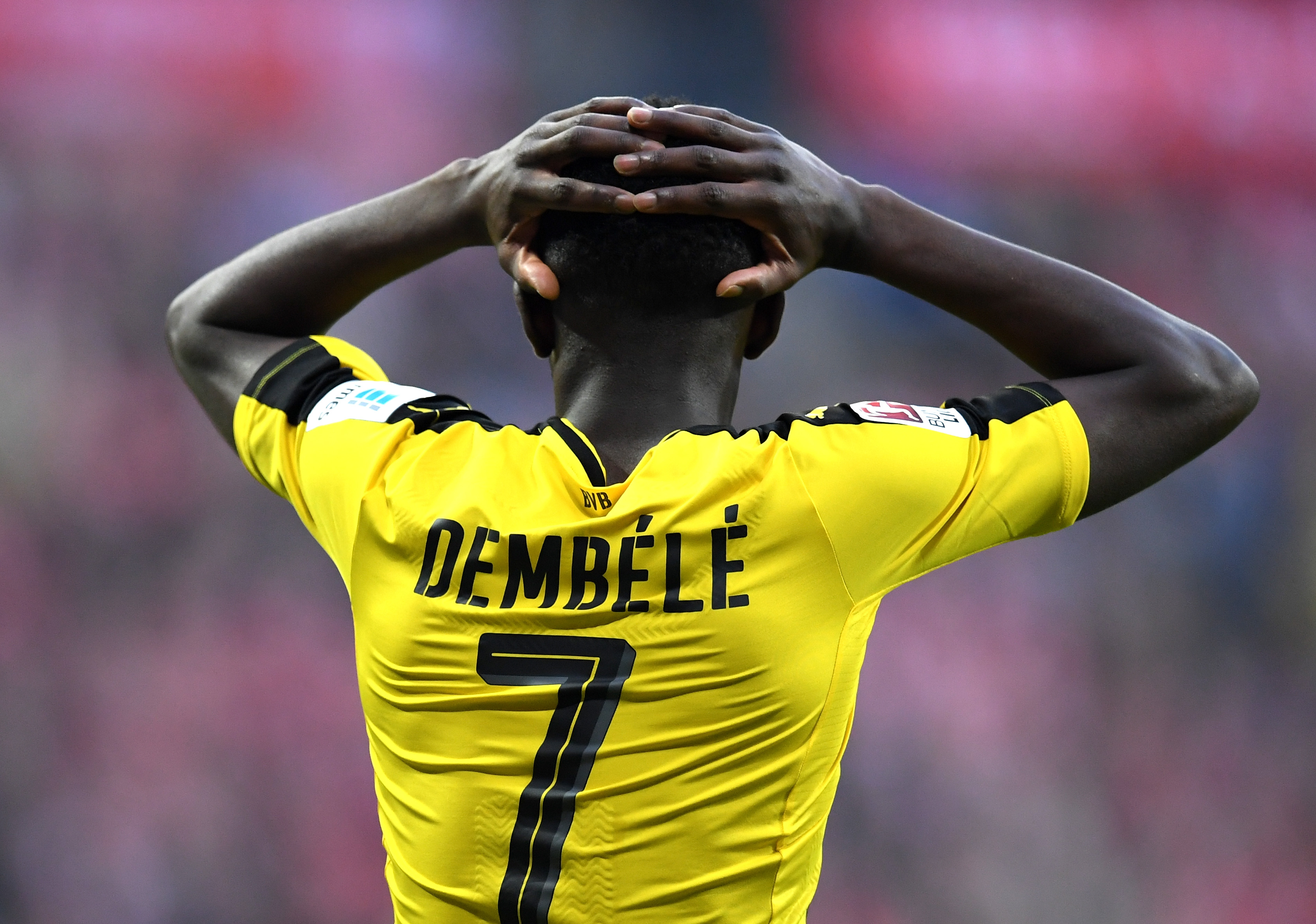 MUNICH, GERMANY - APRIL 08: Ousmane Dembele of Borussia Dortmund reacts during the Bundesliga match between Bayern Muenchen and Borussia Dortmund at Allianz Arena on April 8, 2017 in Munich, Germany.  (Photo by Matthias Hangst/Bongarts/Getty Images)