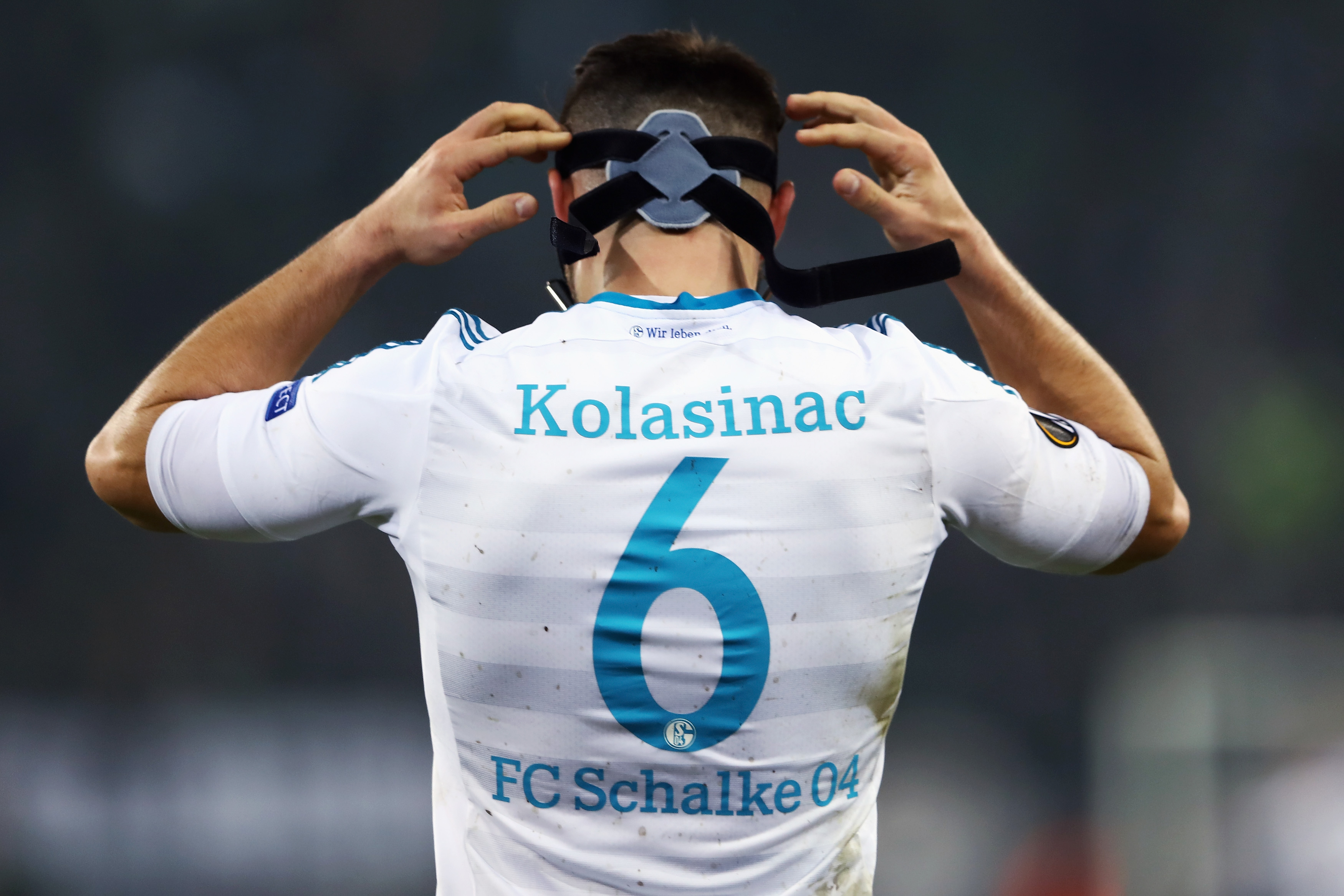 MOENCHENGLADBACH, GERMANY - MARCH 16:  Sead Kolasinac of Schalke reacts after the UEFA Europa  League Round of 16 second leg match between Borussia Moenchengladbach and FC Schalke 04 at Borussia Park Stadium on March 16, 2017 in Moenchengladbach, Germany.  (Photo by Alex Grimm/Bongarts/Getty Images )