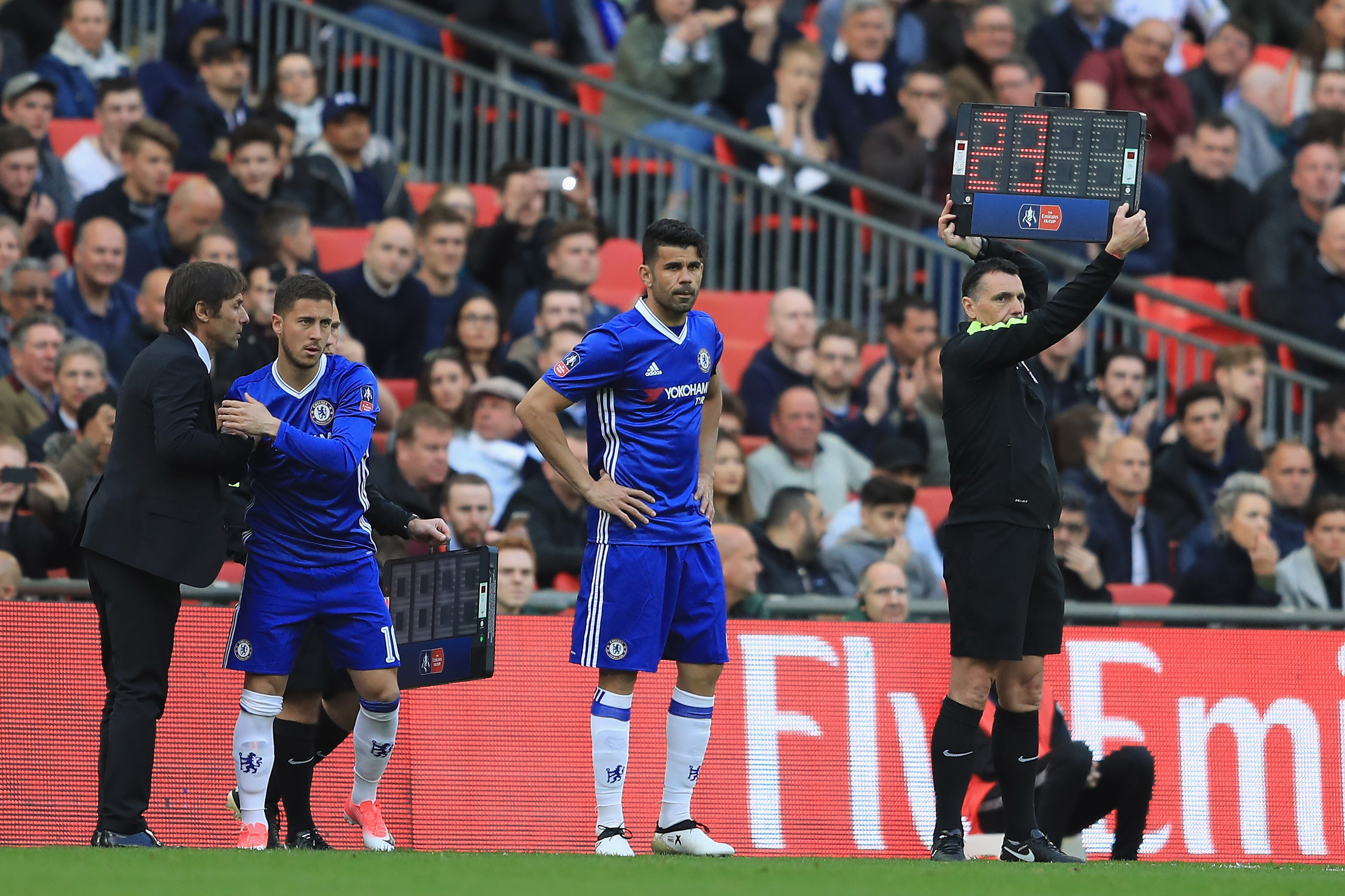 LONDON, ENGLAND - APRIL 22:  Eden Hazard of Chelsea and Diego Costa of Chelsea prepare to come on during The Emirates FA Cup Semi-Final between Chelsea and Tottenham Hotspur at Wembley Stadium on April 22, 2017 in London, England.  (Photo by Richard Heathcote/Getty Images)