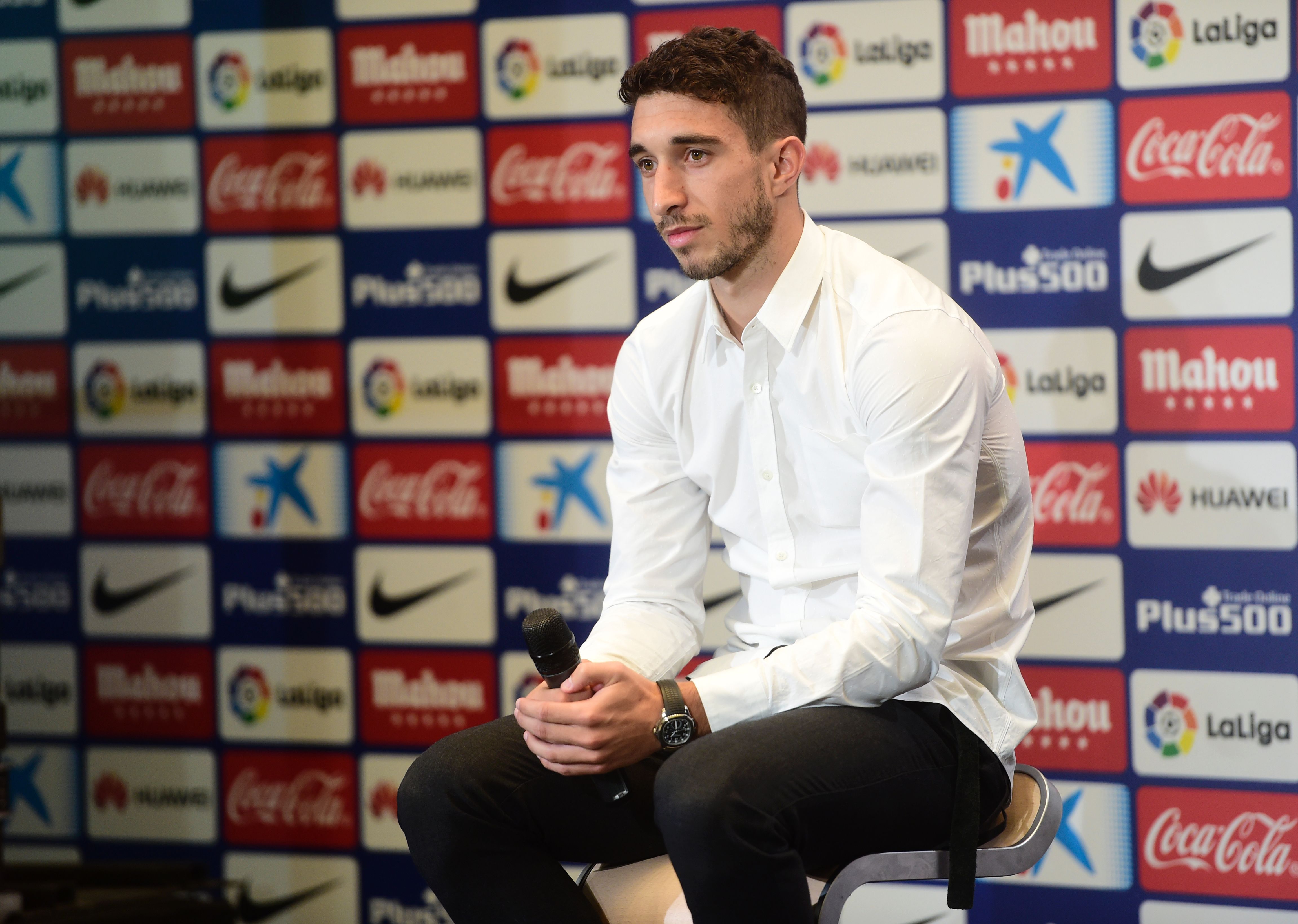 Atletico de Madrid's Croatian defender Sime Vrsaljko listens to journalists during his presentation as new player of the club at the Vicente Calderon stadium in Madrid on July 18, 2016. / AFP / PIERRE-PHILIPPE MARCOU        (Photo credit should read PIERRE-PHILIPPE MARCOU/AFP/Getty Images)