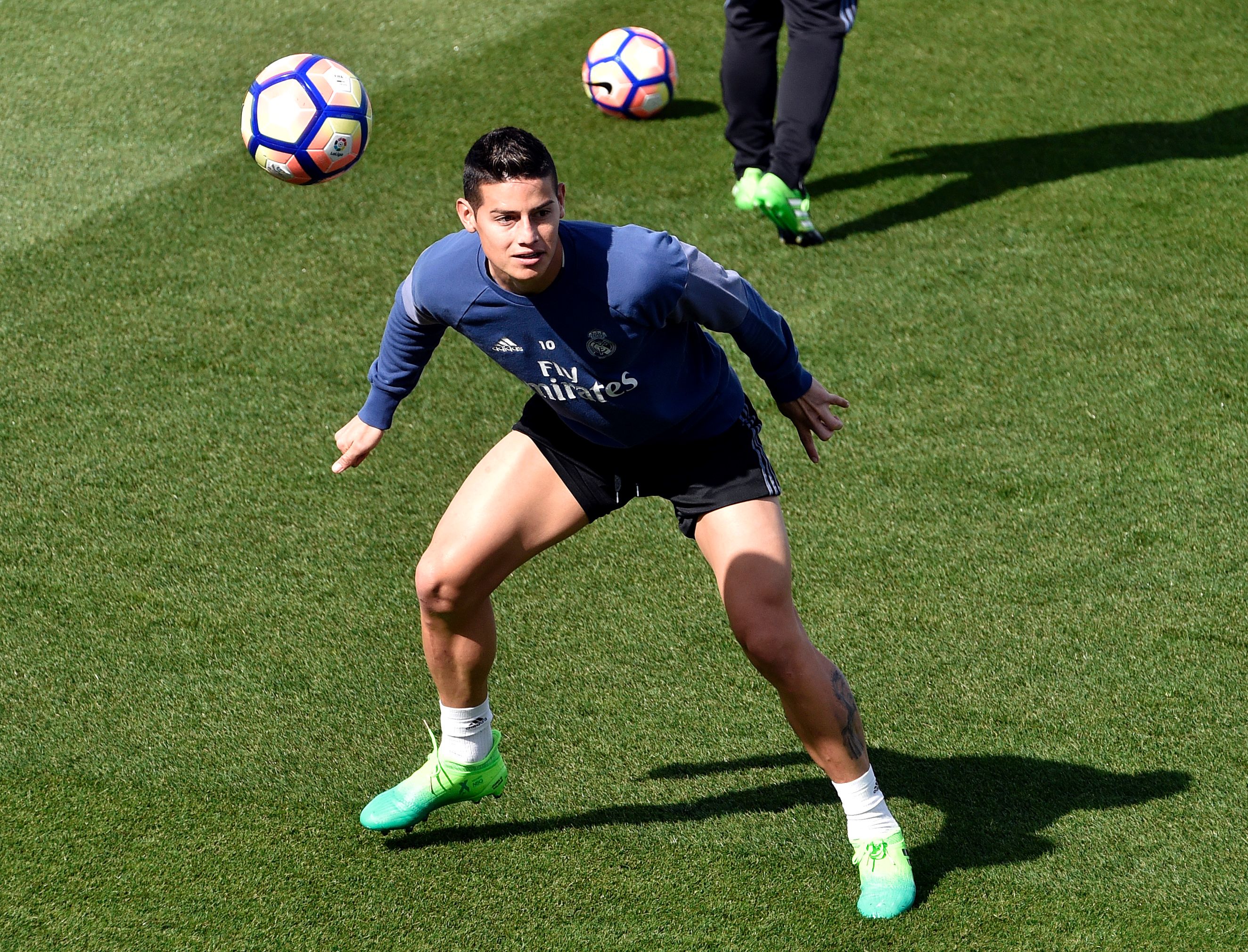 Real Madrid's Colombian midfielder James Rodriguez heads a ball during a training session at Valdebebas training ground in Madrid on April 22, 2017, on the eve of the Spanish League Clasico football match Real Madrid CF vs FC Barcelona. / AFP PHOTO / GERARD JULIEN        (Photo credit should read GERARD JULIEN/AFP/Getty Images)