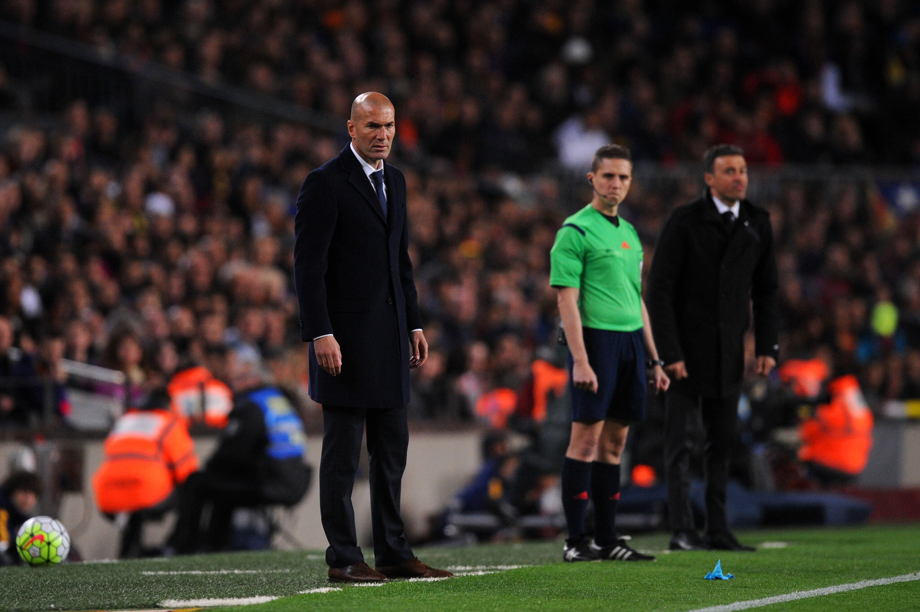 BARCELONA, SPAIN - APRIL 02:  Zinedine Zidane, Head Coach of Real Madrid CF looks on next to Luis Enrique, Head Coach of FC Barcelona during the La Liga match between FC Barcelona and Real Madrid CF at Camp Nou on April 2, 2016 in Barcelona, Spain.  (Photo by Alex Caparros/Getty Images)