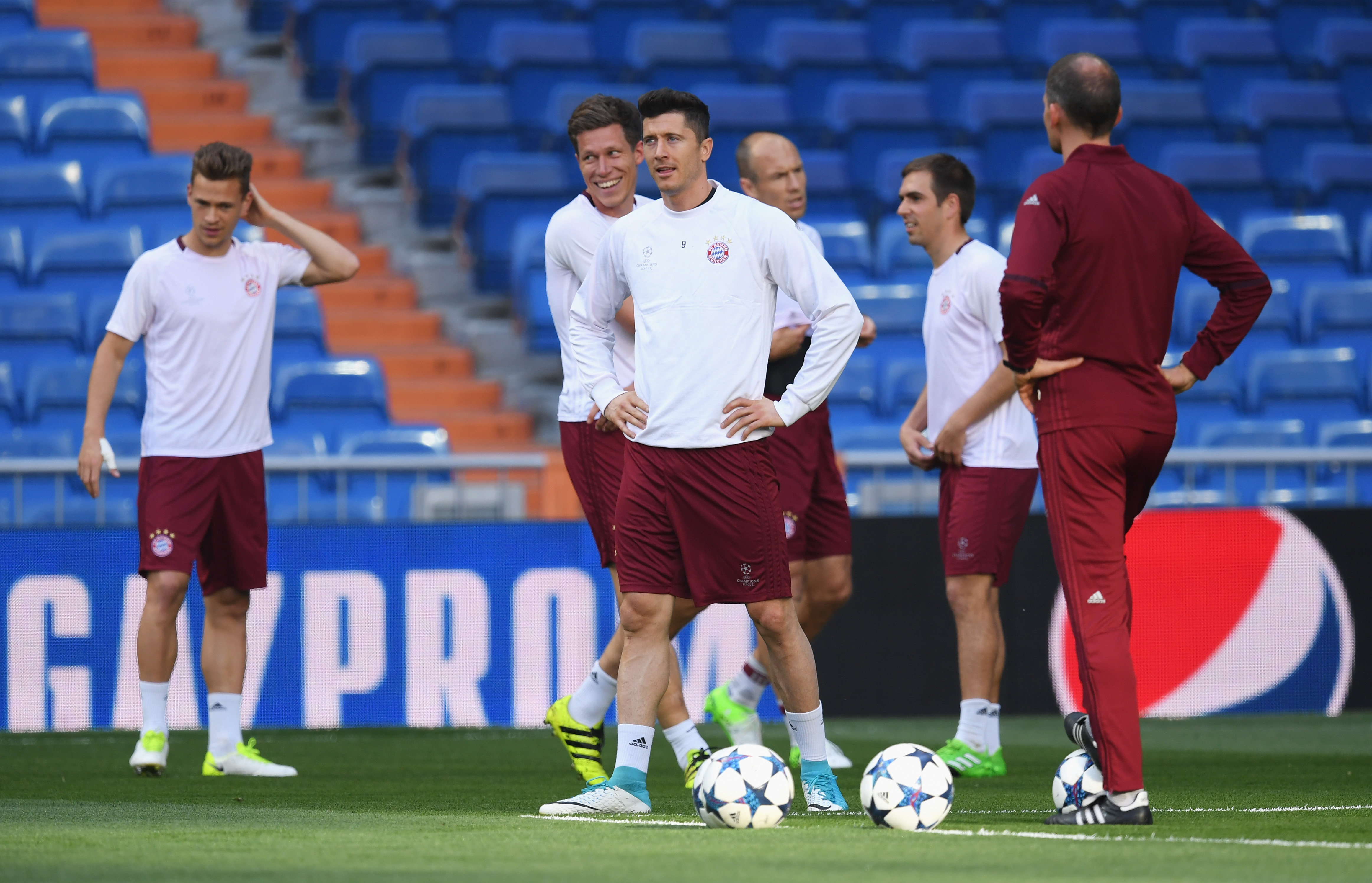 MADRID, SPAIN - APRIL 17: Robert Lewandowski of Bayern Muenchen looks on with team mates during a training session at Estadio Santiago Bernabeu on April 17, 2017 in Madrid, Spain.  (Photo by Matthias Hangst/Bongarts/Getty Images)