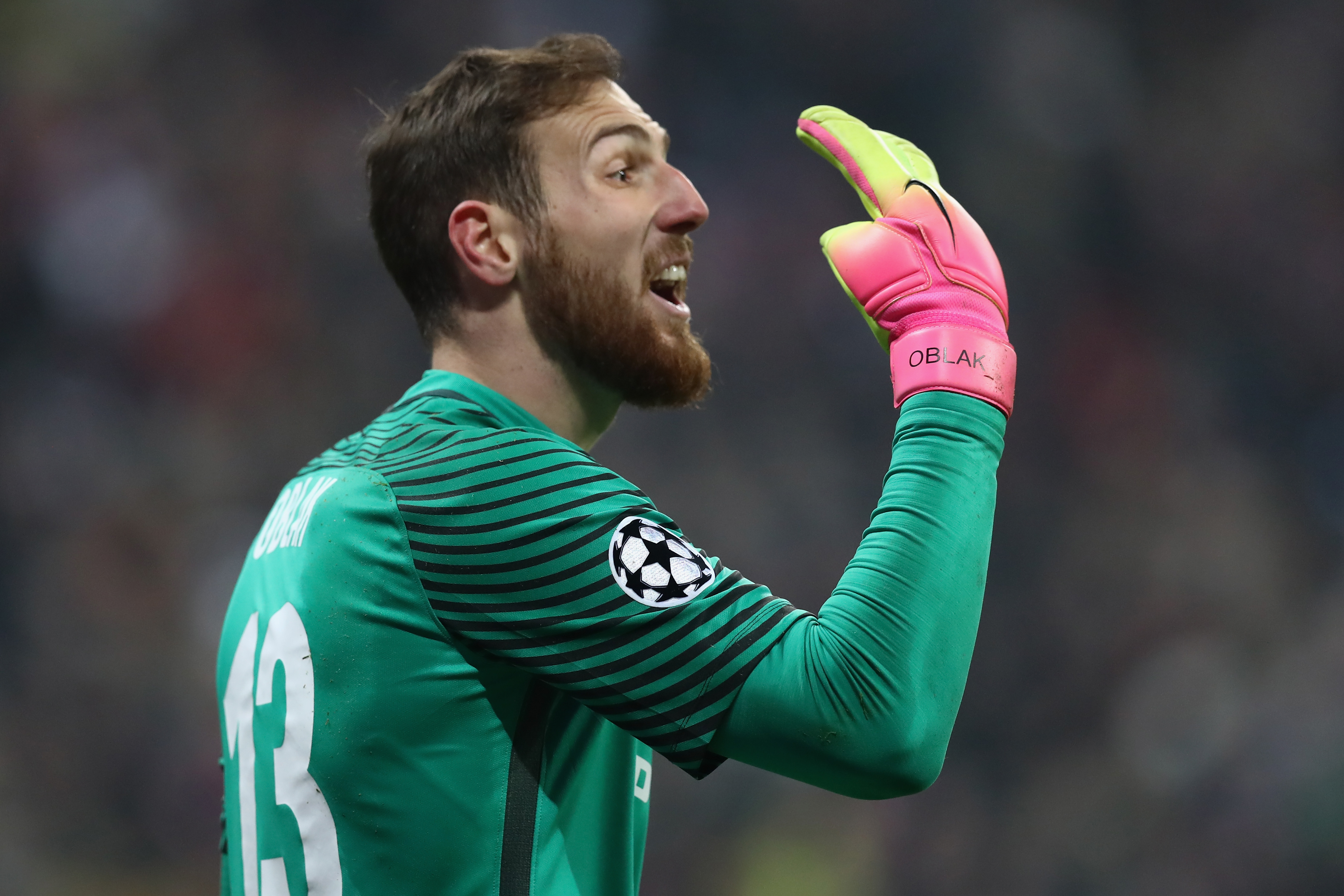 MUNICH, GERMANY - DECEMBER 06:  Jan Oblak of Atletico reacts during the UEFA Champions League match between FC Bayern Muenchen and Club Atletico de Madrid at Allianz Arena on December 6, 2016 in Munich, Bavaria.  (Photo by Alexander Hassenstein/Bongarts/Getty Images)