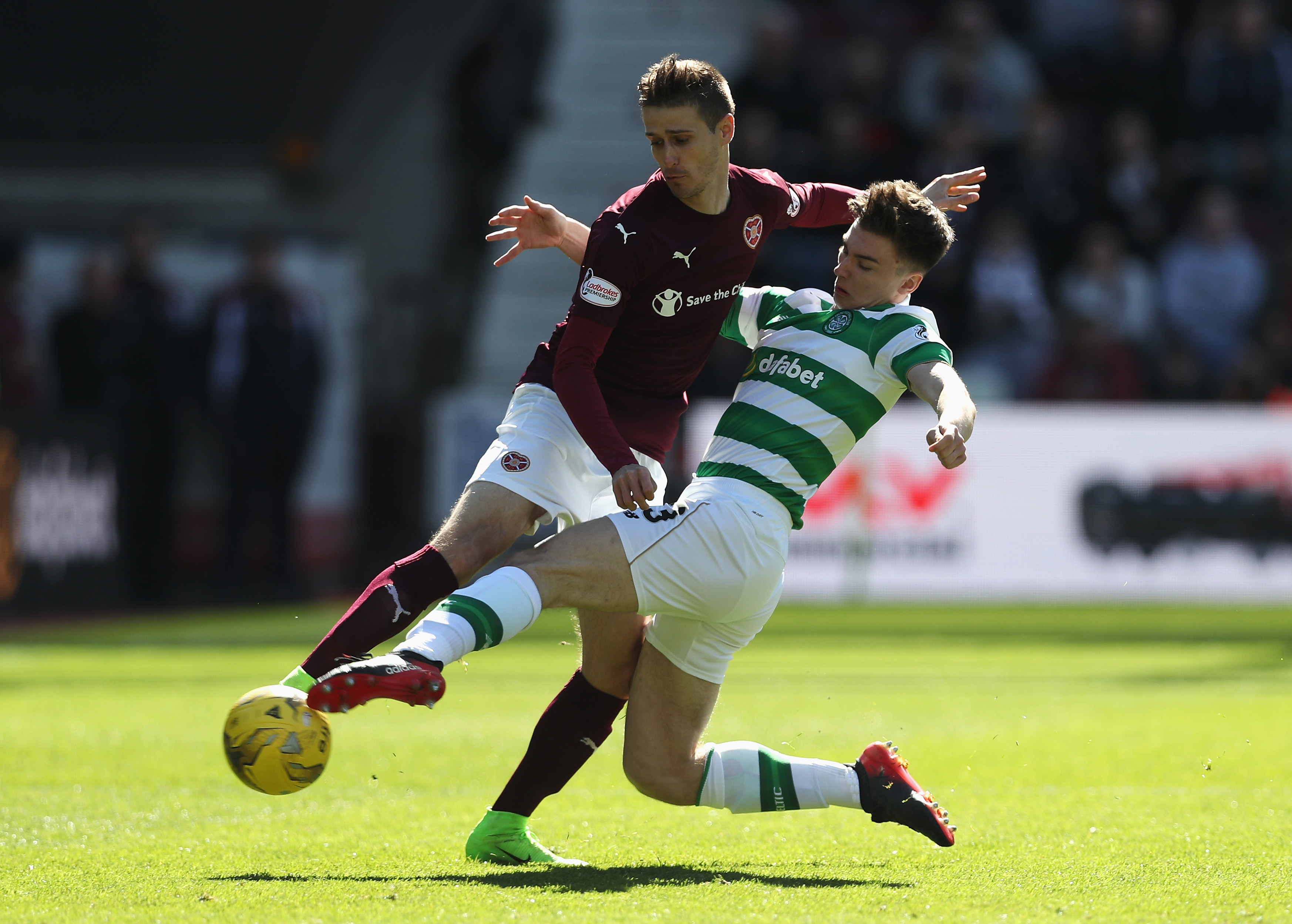 EDINBURGH, SCOTLAND - APRIL 02:  Andraz Struna of Hearts (L) and Kieran Tierney of Celtic (R) battle for possession during the Ladbrokes Scottish Premiership match between Hearts and Celtic at Tynecastle Stadium on April 2, 2017 in Edinburgh, Scotland.  (Photo by Ian MacNicol/Getty Images)