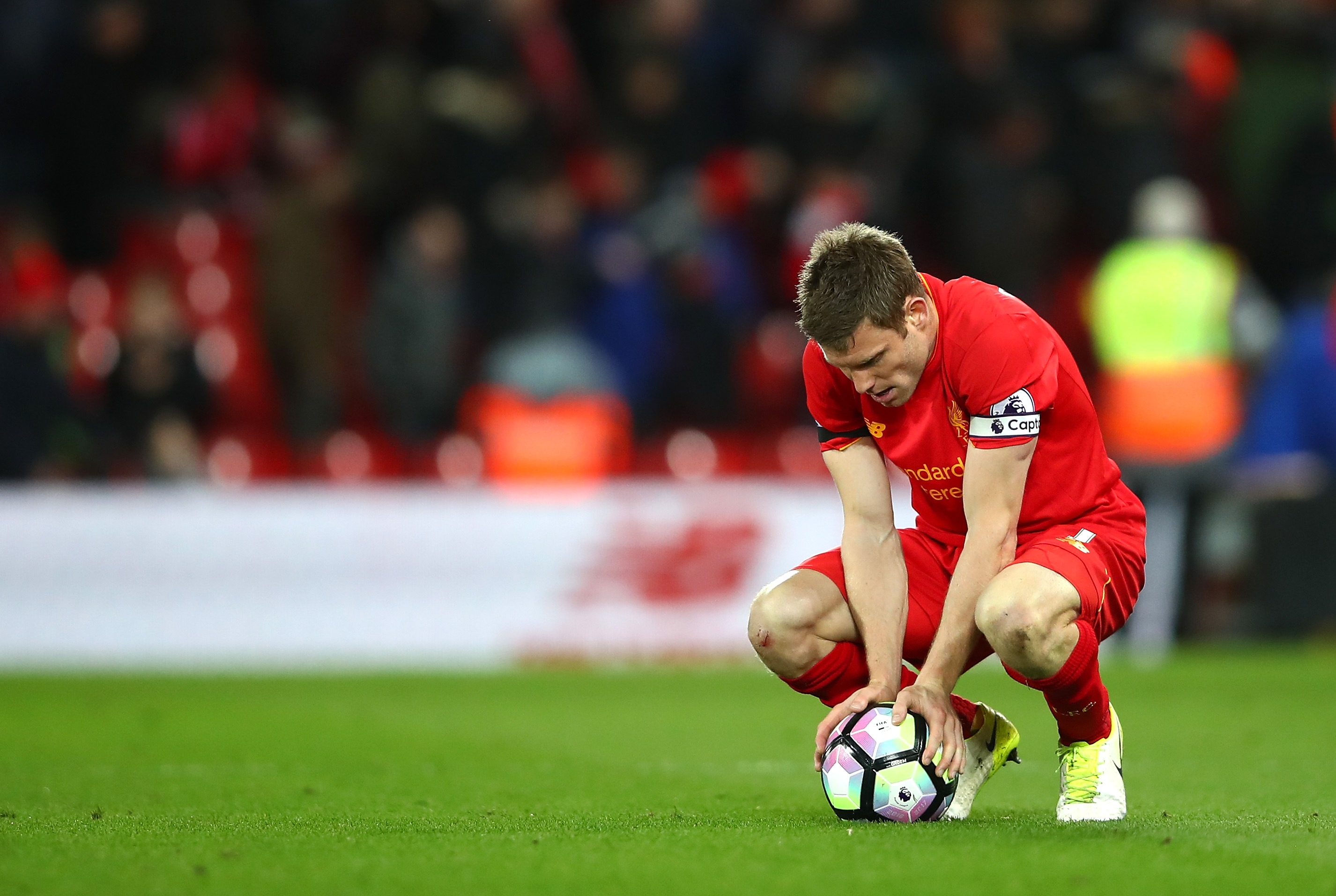 LIVERPOOL, ENGLAND - APRIL 05: James Milner of Liverpool looks dejected after the Premier League match between Liverpool and AFC Bournemouth at Anfield on April 5, 2017 in Liverpool, England.  (Photo by Clive Brunskill/Getty Images)