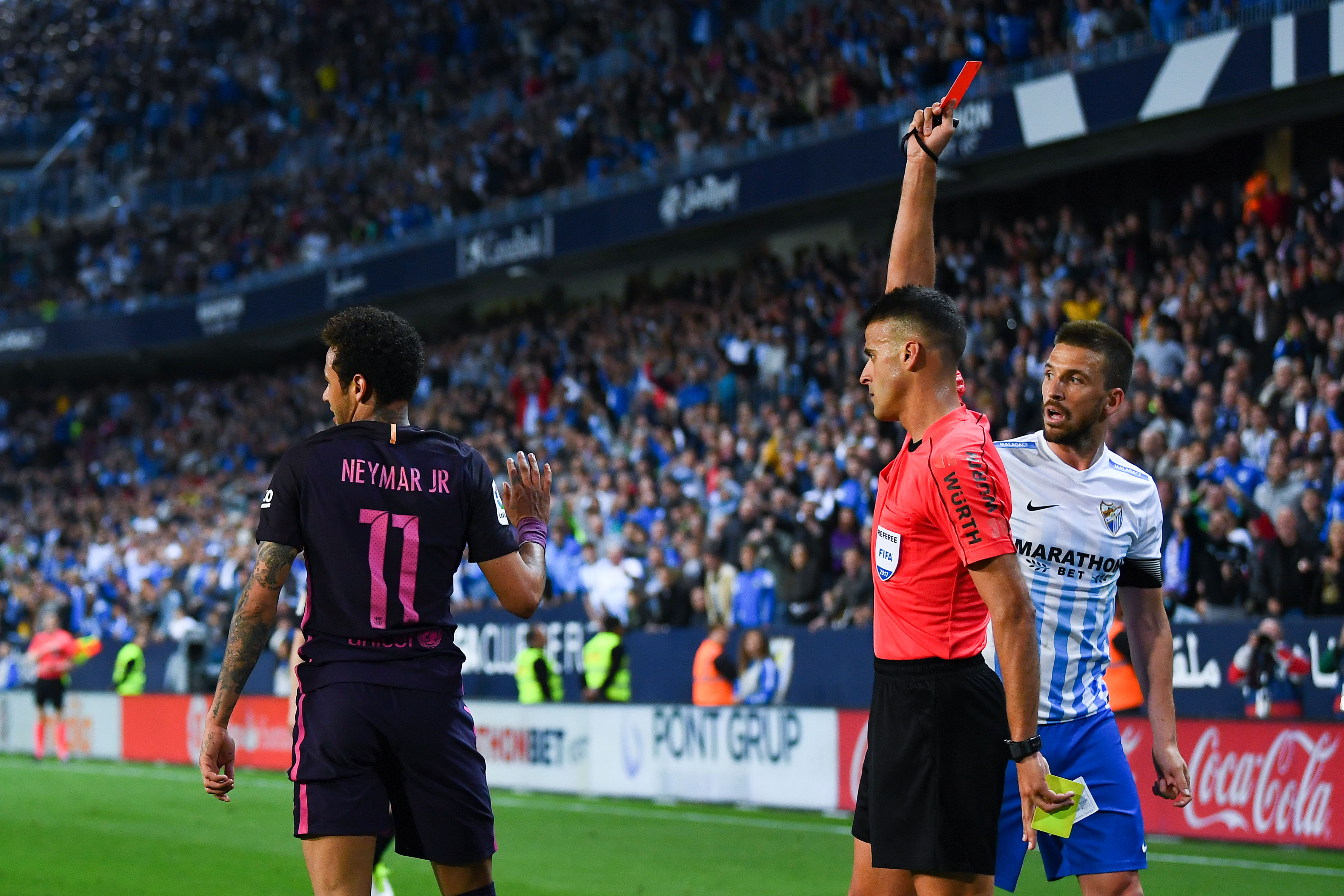MALAGA, SPAIN - APRIL 08:  Neymar Jr. of FC Barcelona is shown a red card during the La Liga match between Malaga CF and FC Barcelona at La Rosaleda stadium on April 8, 2017 in Malaga, Spain.  (Photo by David Ramos/Getty Images)