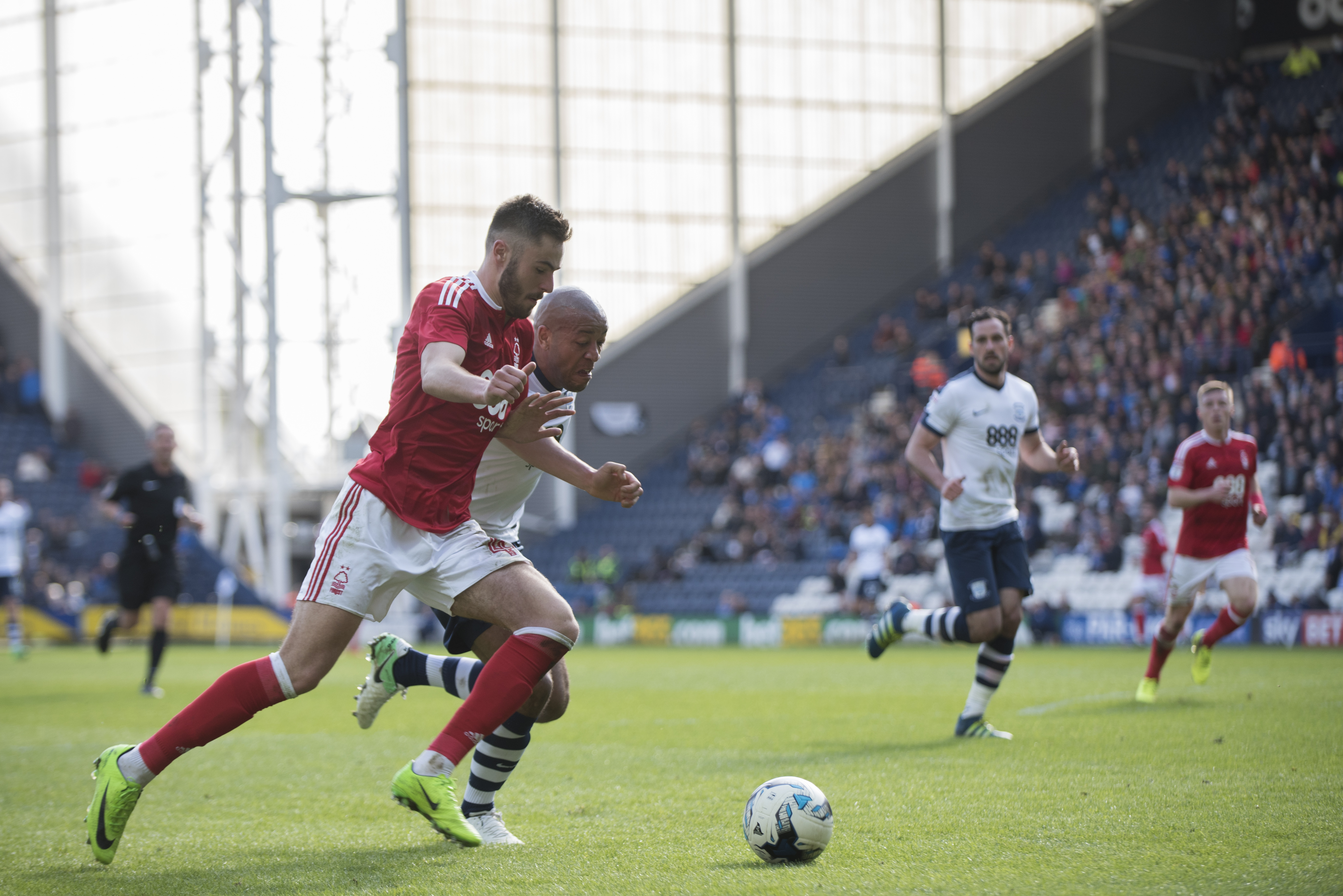 PRESTON, ENGLAND- APRIL 1:  Ben Brereton of Nottingham Forest and Alex Baptise of Preston North End  in action during the Sky Bet Championship match between Preston North End and Nottingham Forest at Deepdale on April 1, 2017 in Preston, England. (Photo by Nathan Stirk/Getty Images)