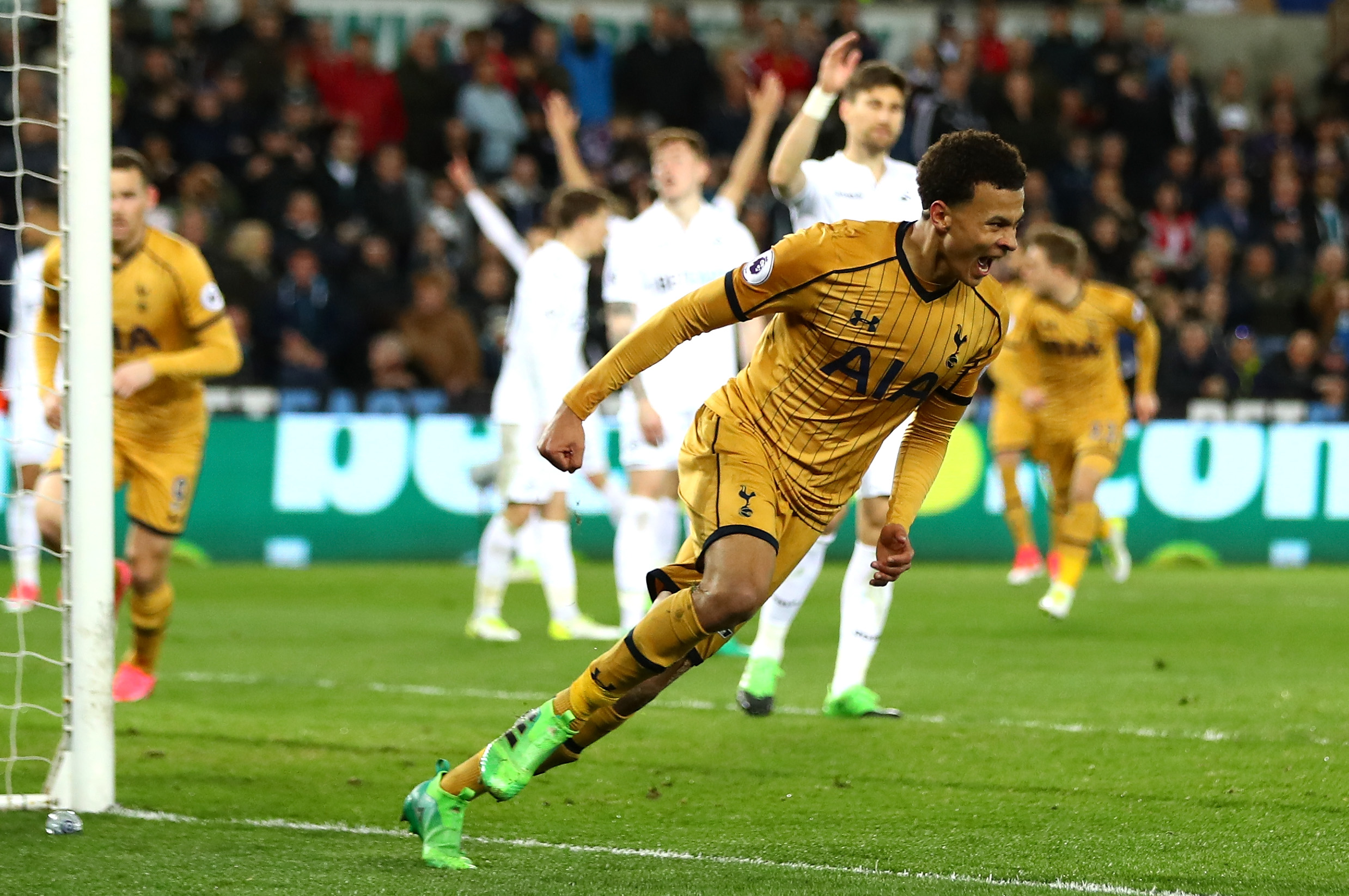 SWANSEA, WALES - APRIL 05: Dele Alli of Tottenham Hotspur celebrates scoring his sides first goal during the Premier League match between Swansea City and Tottenham Hotspur at the Liberty Stadium on April 5, 2017 in Swansea, Wales.  (Photo by Michael Steele/Getty Images)