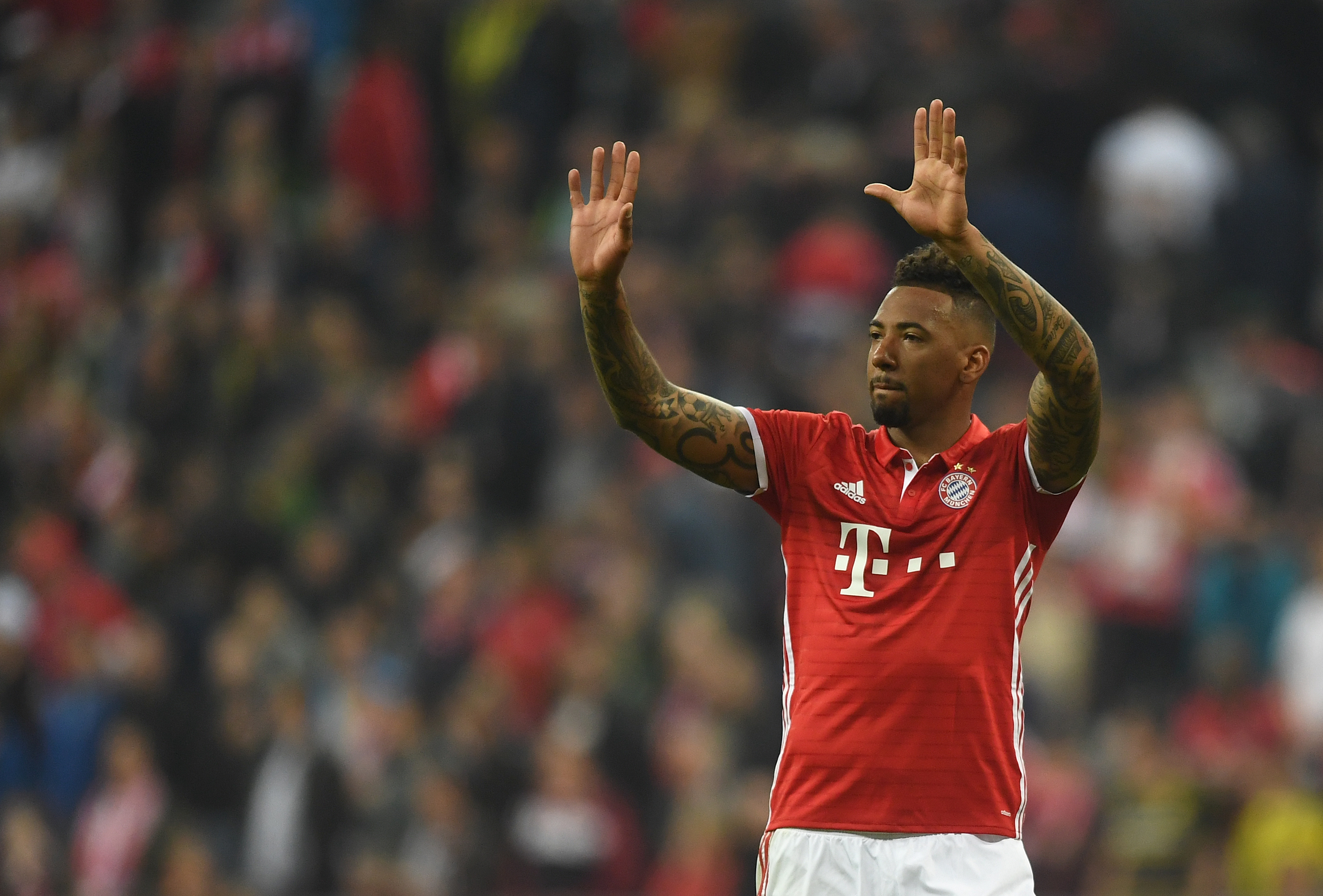 MUNICH, GERMANY - APRIL 08: Jerome Boateng of FC Bayern Muenchen waves to the fans after the Bundesliga match between Bayern Muenchen and Borussia Dortmund at Allianz Arena on April 8, 2017 in Munich, Germany. (Photo by Lennart Preiss/Bongarts/Getty Images)