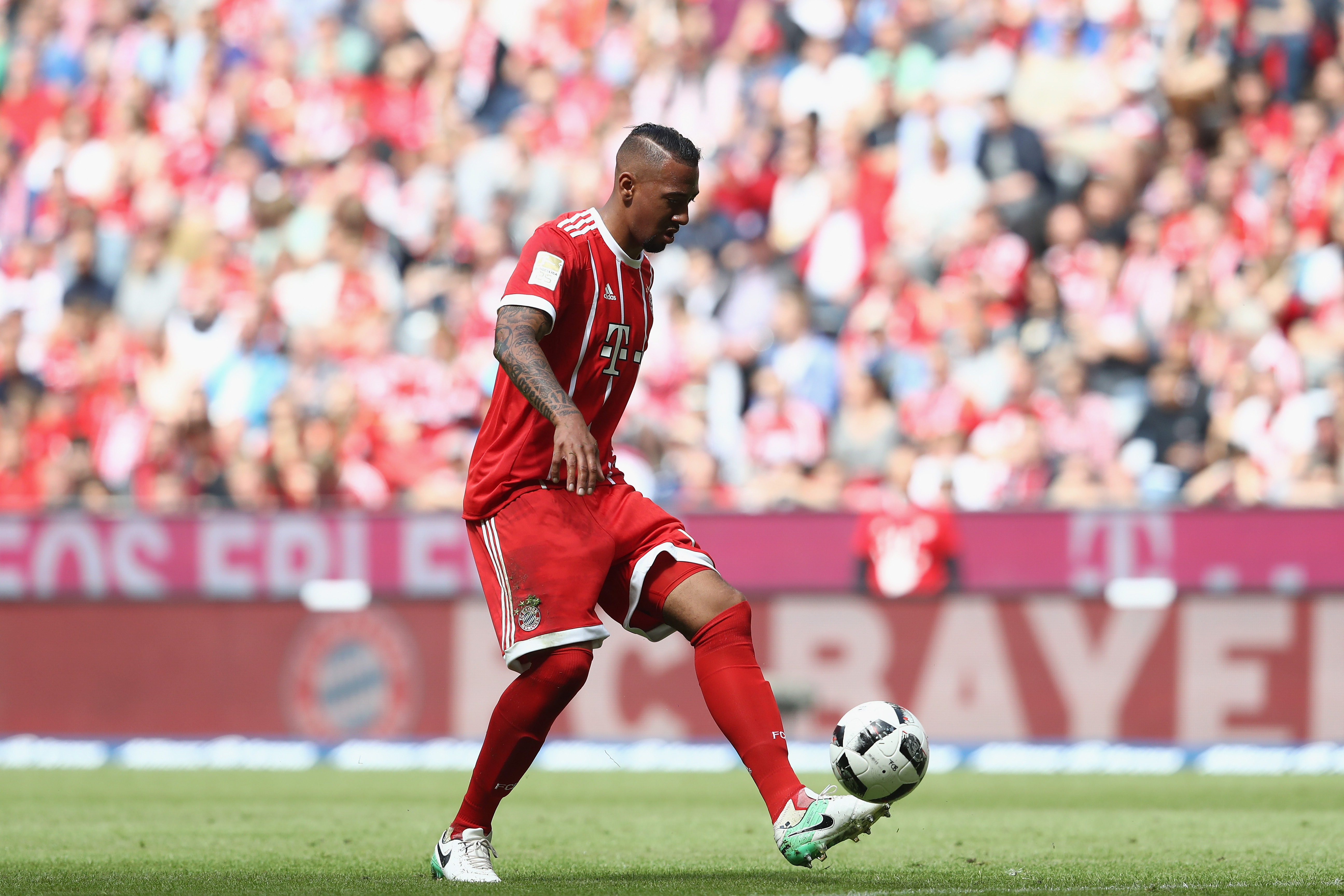 MUNICH, GERMANY - MAY 20:  Jerome Boateng  of Bayern Muenchen runs with the ball during the Bundesliga match between Bayern Muenchen and SC Freiburg at Allianz Arena on May 20, 2017 in Munich, Germany.  (Photo by Alexander Hassenstein/Bongarts/Getty Images)