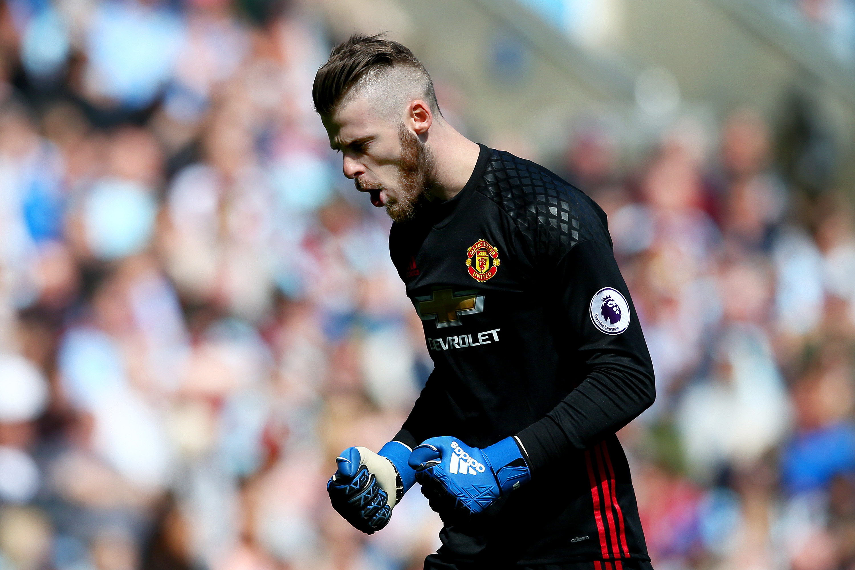 BURNLEY, ENGLAND - APRIL 23:  David De Gea of Manchester United celebrates after team-mate Anthony Martial scored the opening goal during the Premier League match between Burnley and Manchester United at Turf Moor on April 23, 2017 in Burnley, England.  (Photo by Jan Kruger/Getty Images)