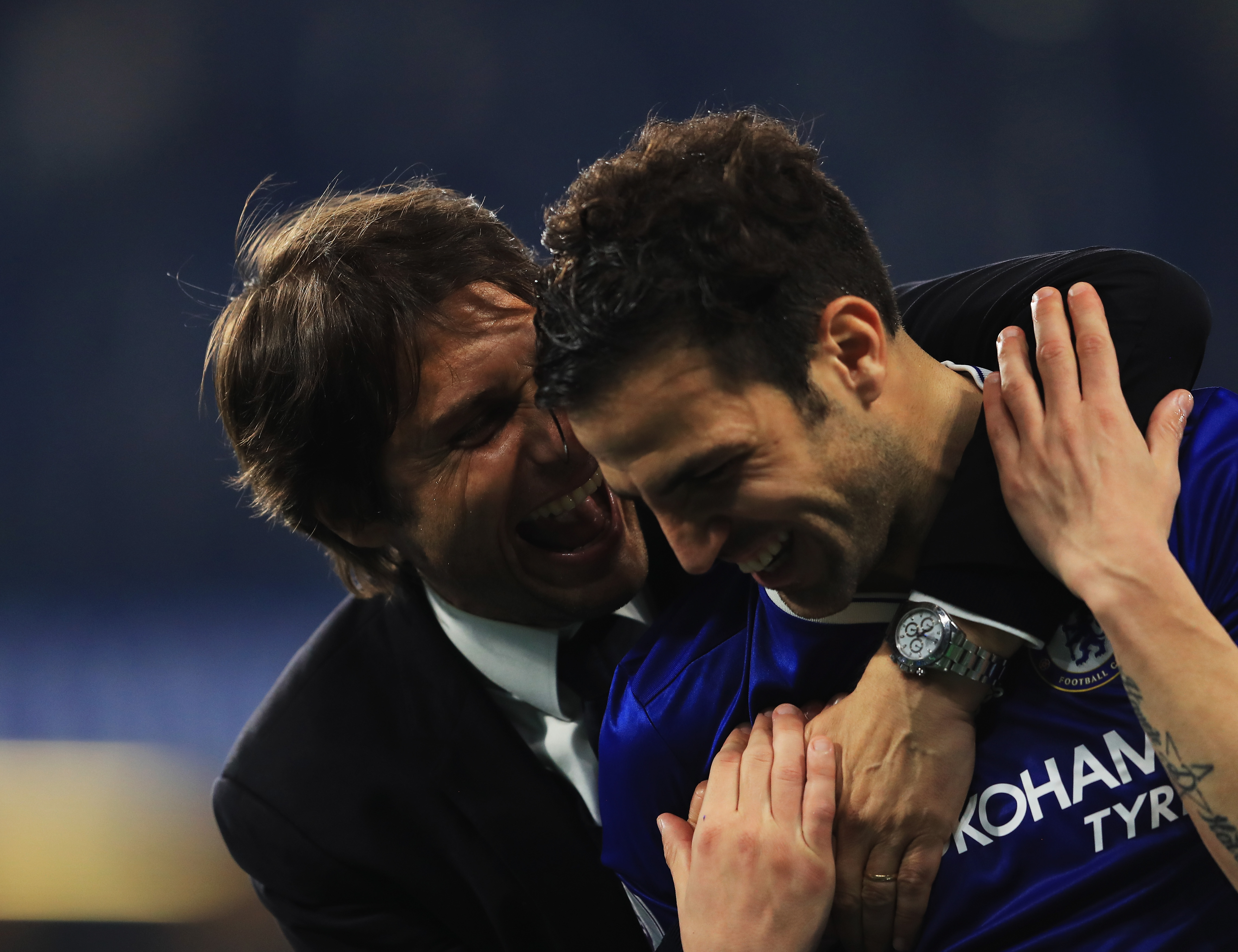 LONDON, ENGLAND - MAY 15: Antonio Conte, Manager of Chelsea speaks to Cesc Fabregas of Chelsea after the Premier League match between Chelsea and Watford at Stamford Bridge on May 15, 2017 in London, England.  (Photo by Richard Heathcote/Getty Images)