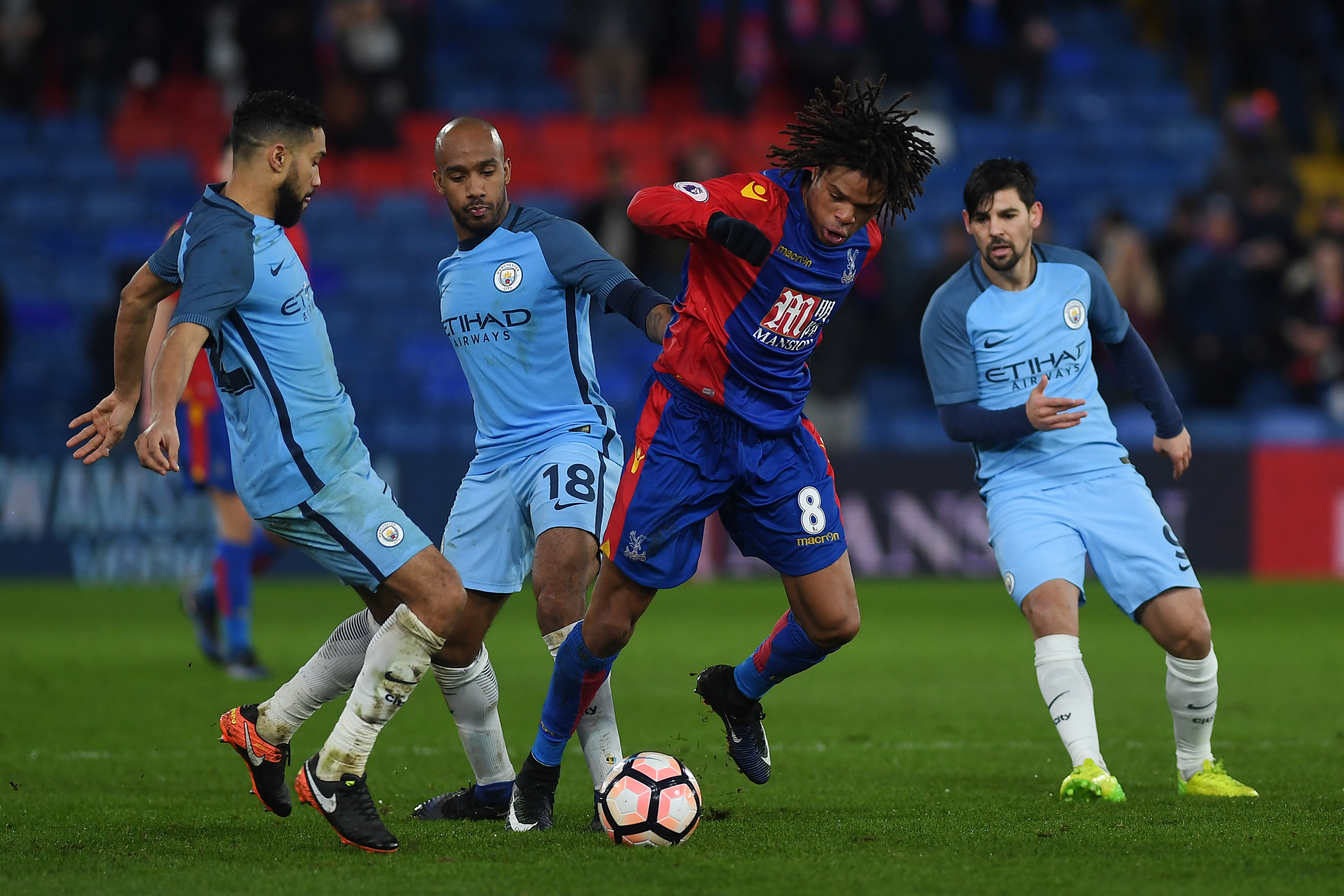 LONDON, ENGLAND - JANUARY 28:  Loic Remy of Crystal Palace is surrounded by Gael Clichy, Fabian Delph and Nolito of Manchester City during the The Emirates FA Cup Fourth Round match between Crystal Palace and Manchester City at Selhurst Park on January 28, 2017 in London, England.  (Photo by Mike Hewitt/Getty Images)