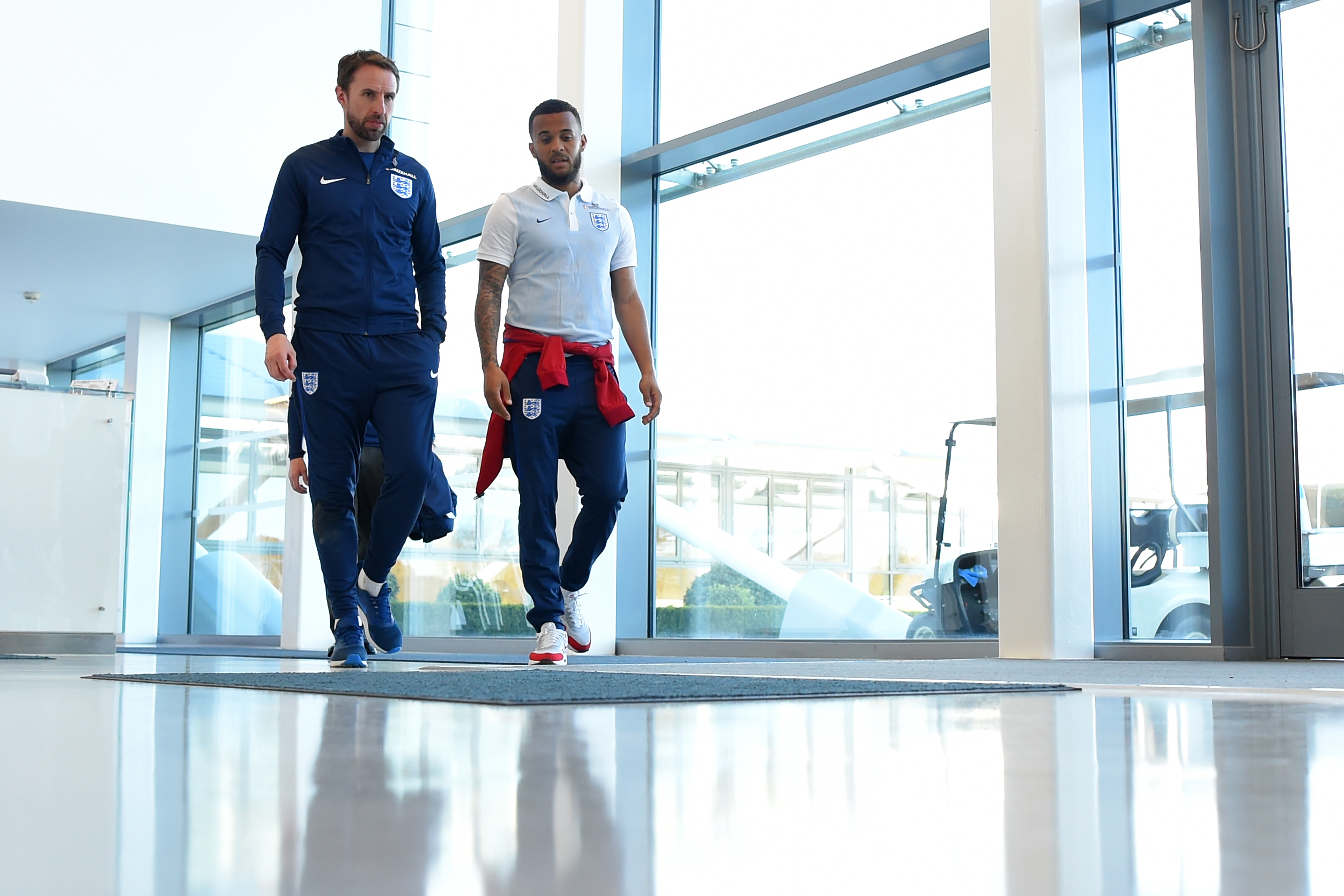 ENFIELD, ENGLAND - MARCH 25:  (L-R) Gareth Southgate the England manager and Ryan Bertrand make their way to the England press conference at the Tottenham Hotspur Training Centre on March 25, 2017 in Enfield, England.  (Photo by Mike Hewitt/Getty Images)