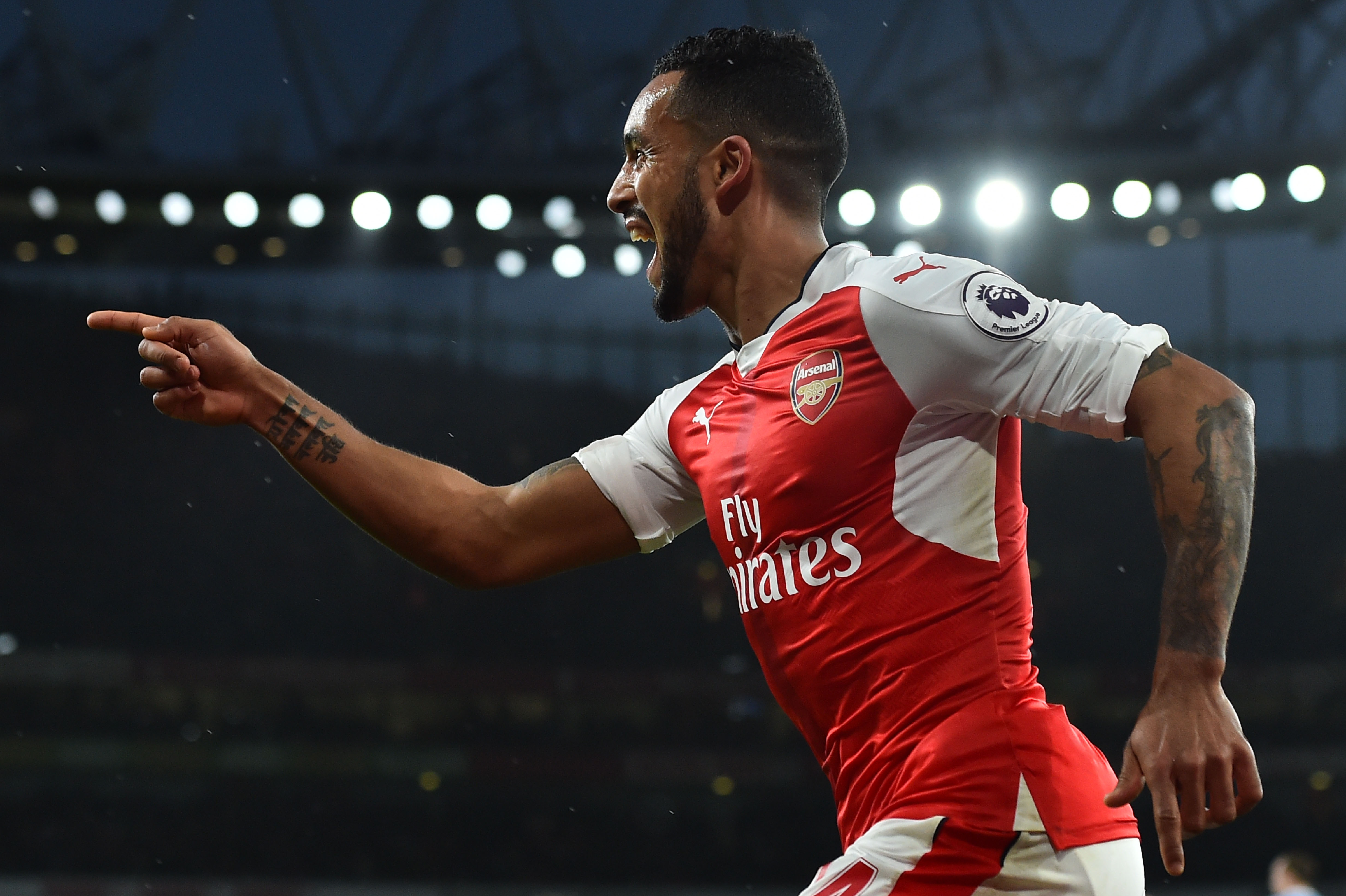 Theo Walcott scored his 100th goal in club football to help Arsenal to a 3-1 win in the reverse fixture. (Photo courtesy - Glyn Kirk/AFP/Getty Images)