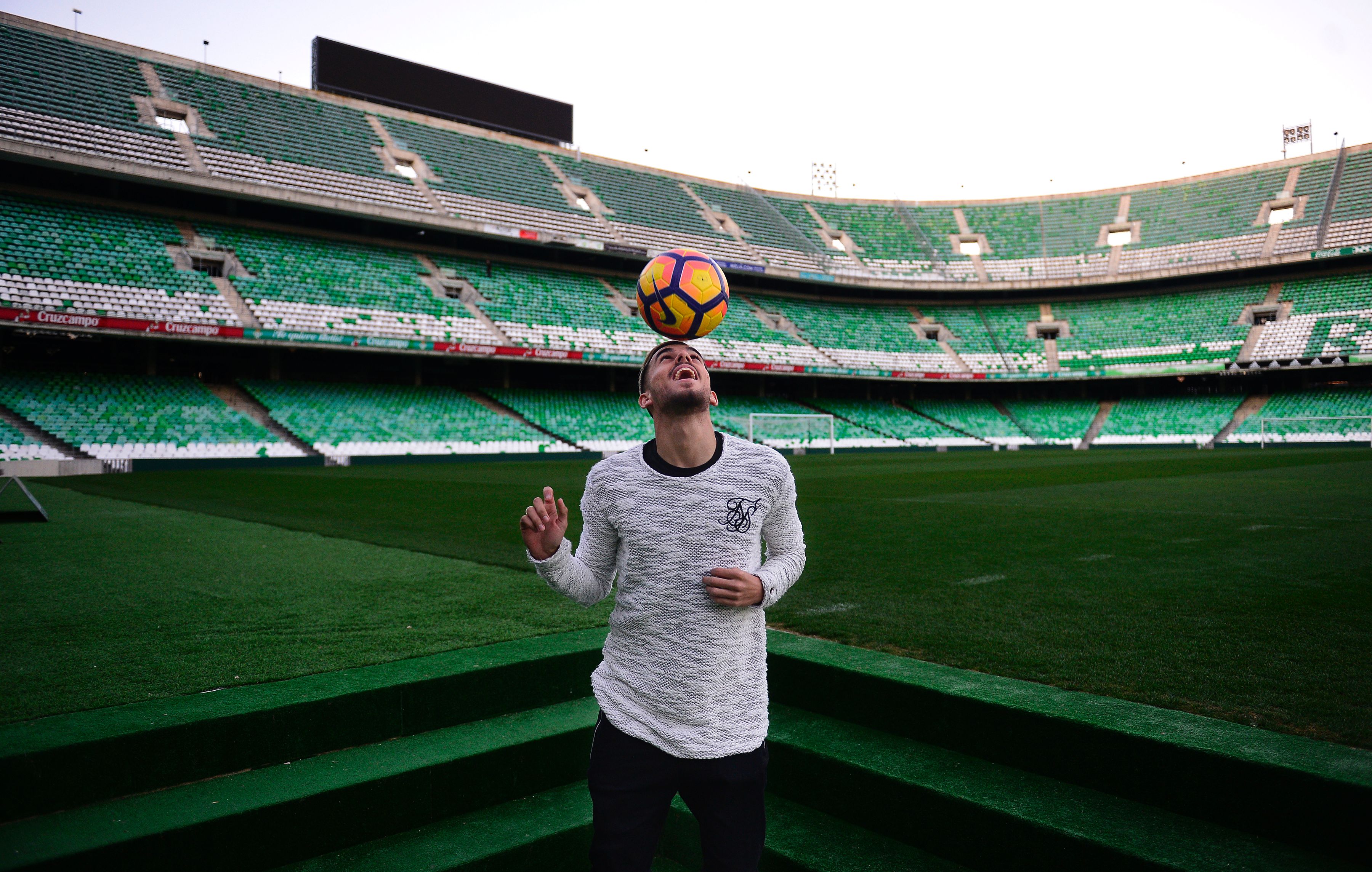 Betis' forward Dani Ceballos poses at the Benito Villamarin stadium, in Sevilla on February 8, 2017.

Seville has two faces: those who like the Holy Week, attending the religious precessions, and those who prefer the April Fair, a spring festival on a flamenco air, between flounced dresses and Traditional outfits. And then there are those who love the green and white of Real Betis Balompie and those who prefer the red and white of Sevilla FC. / AFP PHOTO / CRISTINA QUICLER        (Photo credit should read CRISTINA QUICLER/AFP/Getty Images)