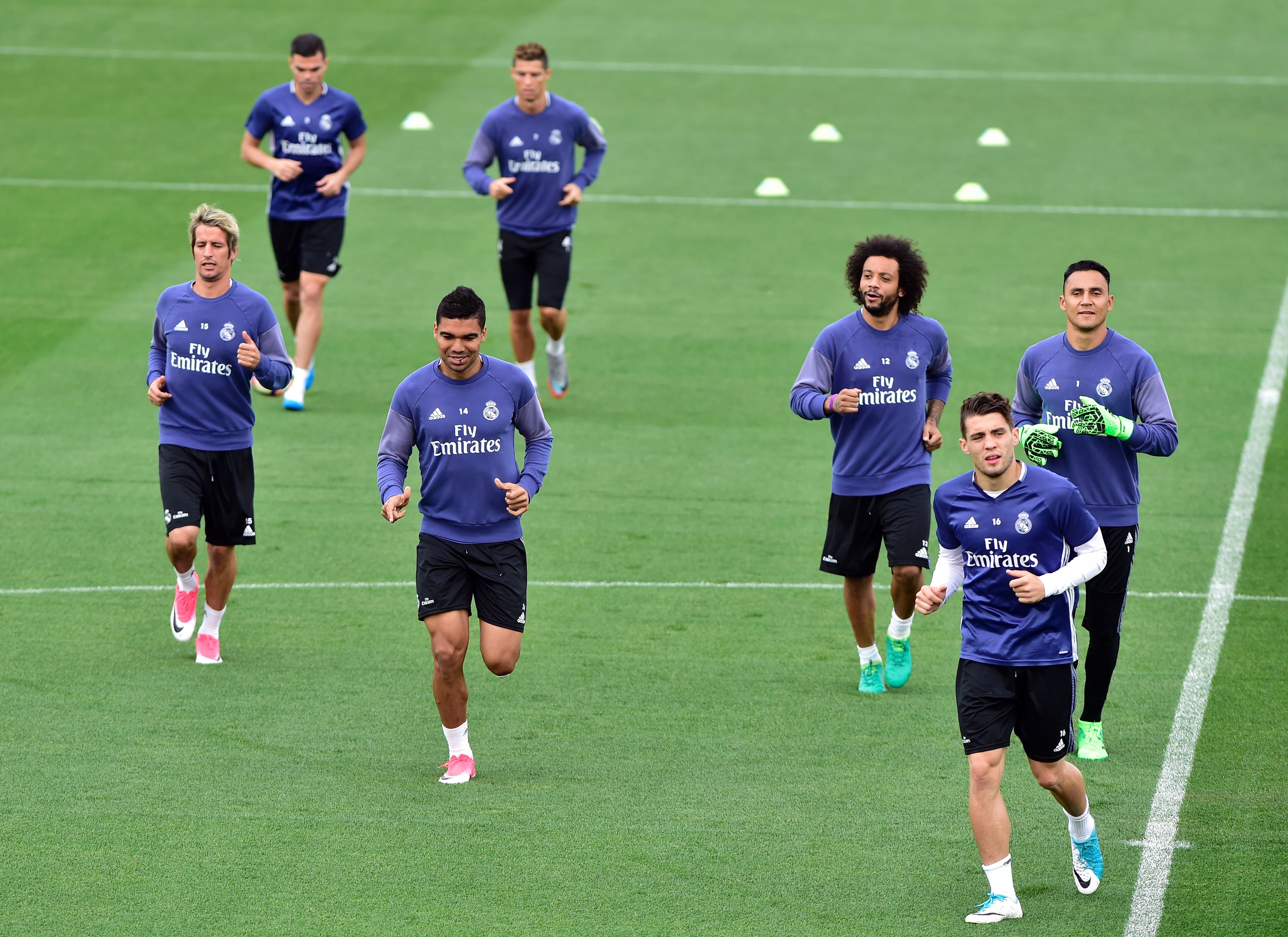 (fromL) Real Madrid's Portuguese defender Fabio Coentrao, Real Madrid's Portuguese defender Pepe, Real Madrid's Brazilian midfielder Casemiro, Real Madrid's Portuguese forward Cristiano Ronaldo, Real Madrid's Brazilian defender Marcelo, Real Madrid's Croatian midfielder Mateo Kovacic and Real Madrid's Costa Rican goalkeeper Keylor Navas take part in a training session at Valdebebas training ground in Madrid on May 5, 2017, on the eve of the Spanish League match football match Granada CF vs Real Madrid CF. / AFP PHOTO / GERARD JULIEN        (Photo credit should read GERARD JULIEN/AFP/Getty Images)