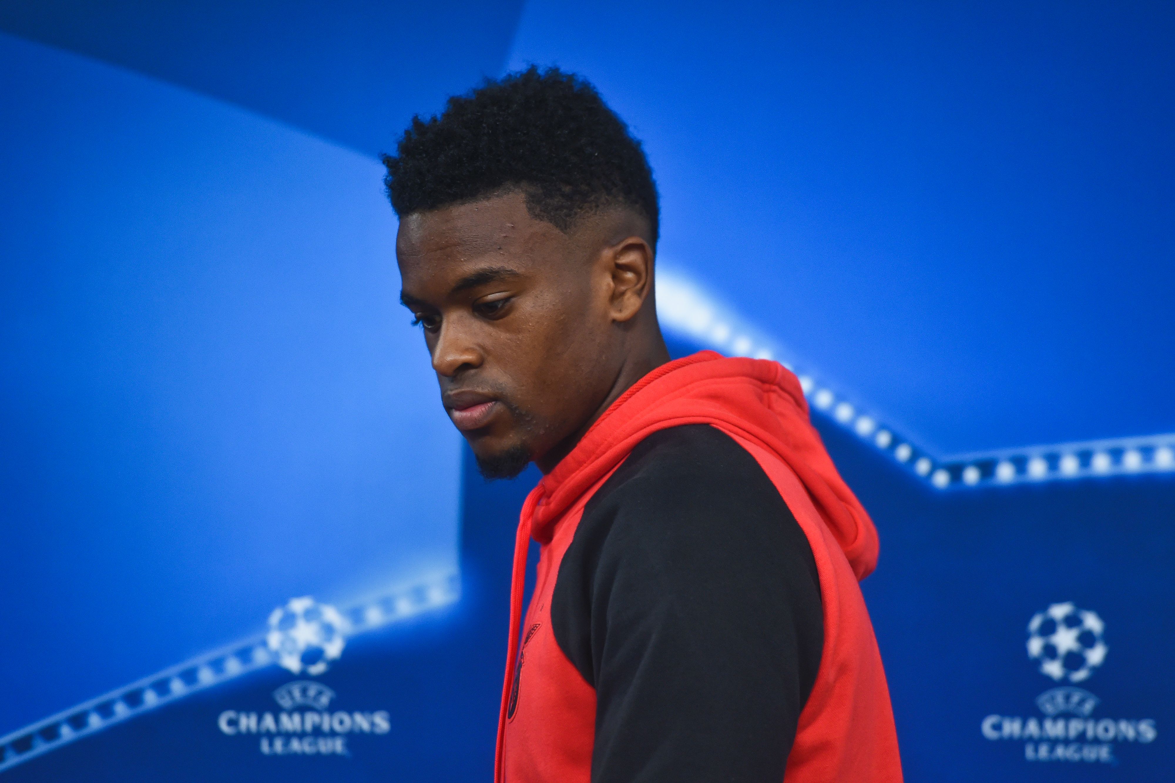 Benfica's defender Nelson Semedo arrives for a press conference at Luz stadium in Lisbon, on December 5, 2016, on the eve of the UEFA Champions League Group B football match SL Benfica vs Napoli.    / AFP / PATRICIA DE MELO MOREIRA        (Photo credit should read PATRICIA DE MELO MOREIRA/AFP/Getty Images)