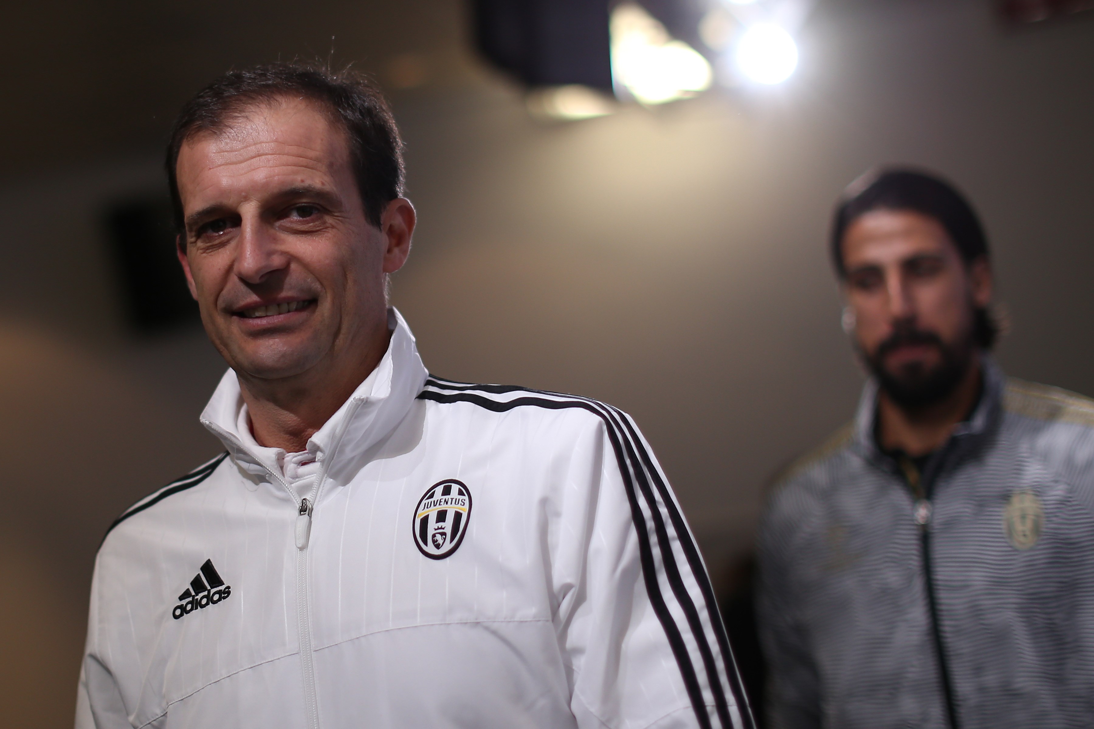 Juventus' coach Massimiliano Allegri (L) and Juventus' midfielder Sami Khedira from Germany give a press conference on the eve of the UEFA Champions League football match Juventus Vs Borussia Moenchengladbach on October 20, 2015 at the 'Juventus Stadium', in Turin.  AFP PHOTO / MARCO BERTORELLO        (Photo credit should read MARCO BERTORELLO/AFP/Getty Images)