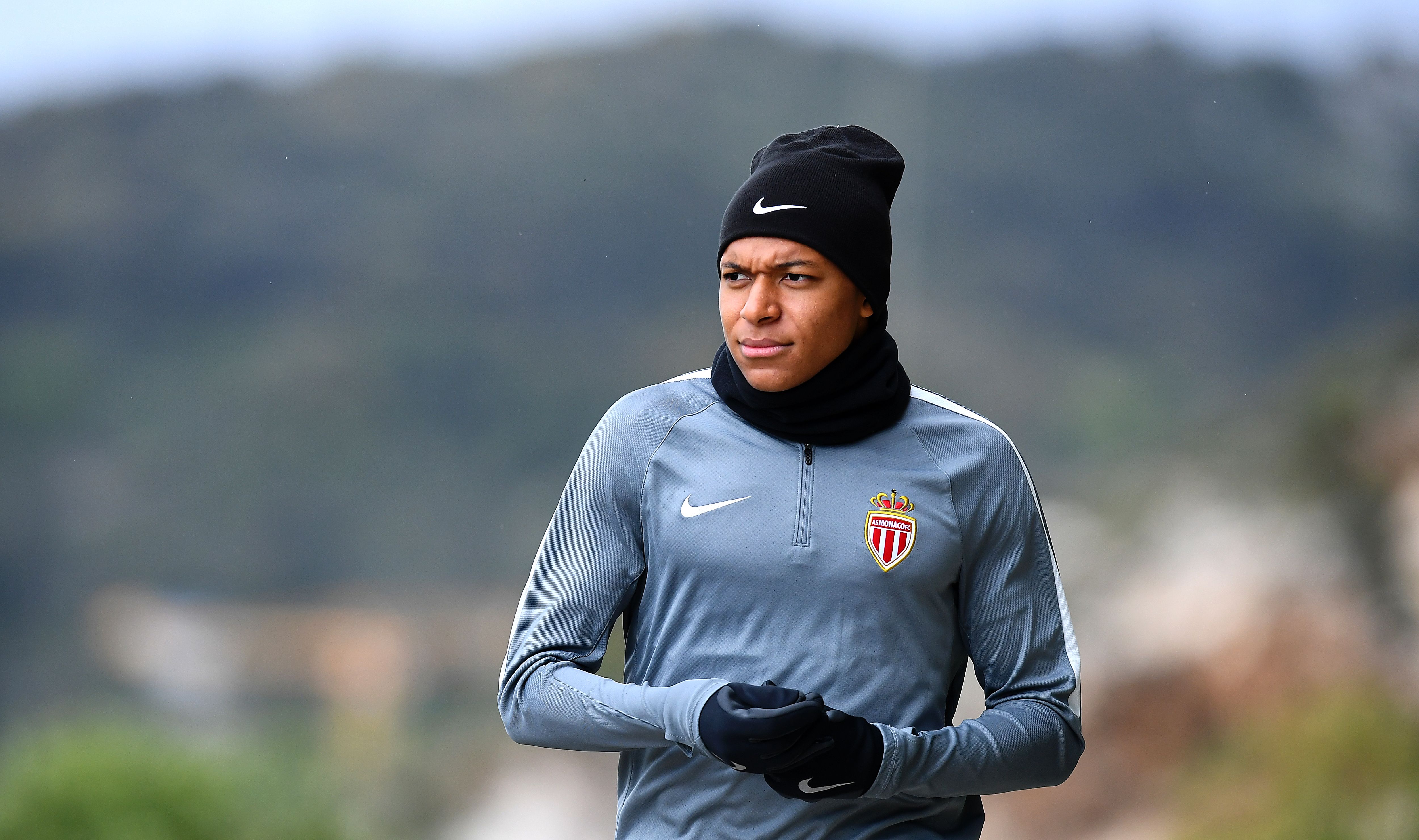 Monaco's French forward Kylian Mbappe arrives for a training session on May 2, 2017 in La Turbie, near Monaco, on the eve of their UEFA Champions League semi-final first leg football match against Juventus. / AFP PHOTO / FRANCK FIFE        (Photo credit should read FRANCK FIFE/AFP/Getty Images)