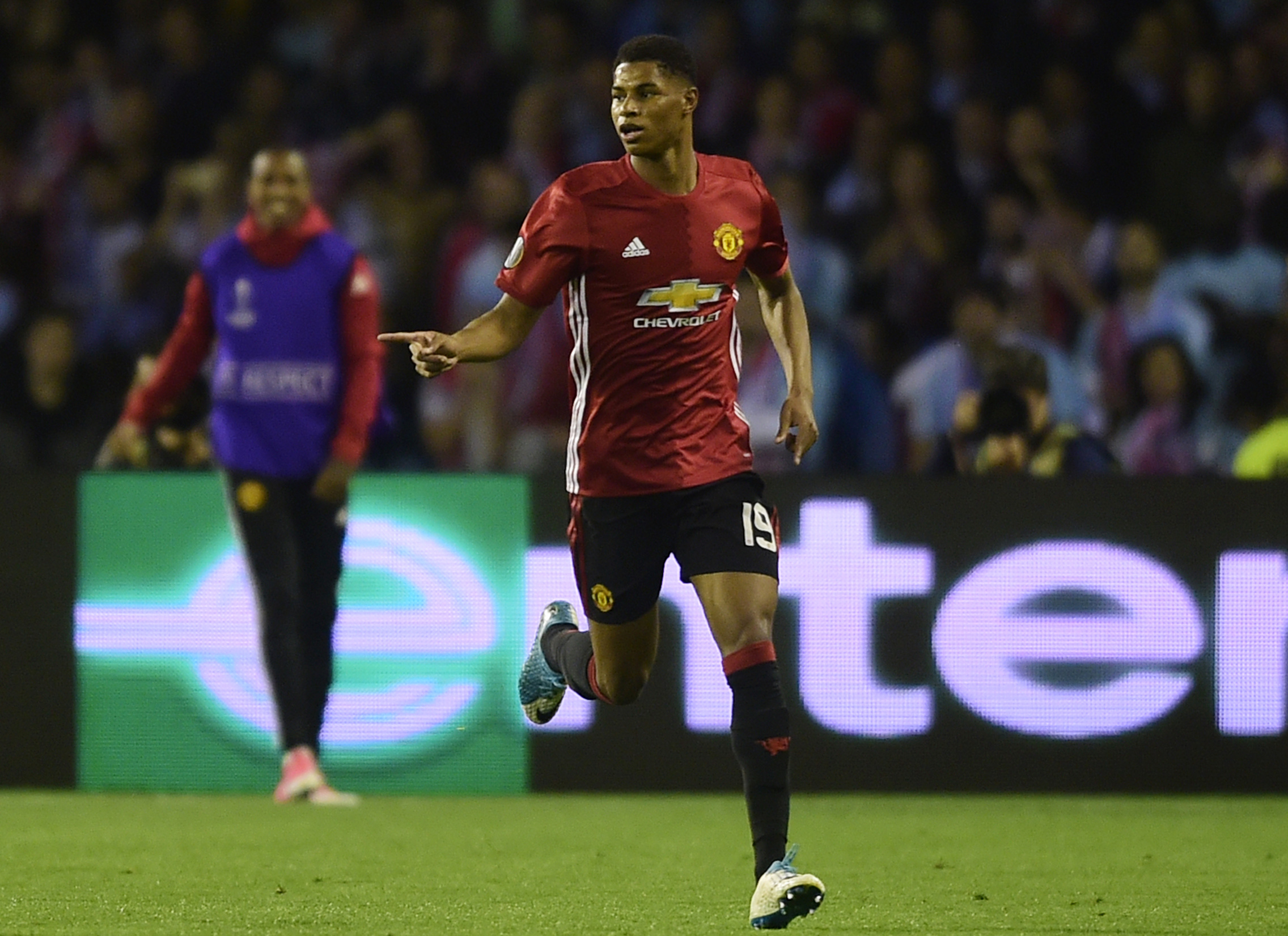 Manchester United's forward Marcus Rashford celebrates after scoring the opener during their UEFA Europa League semi final first leg football match RC Celta de Vigo vs Manchester United FC at the Balaidos stadium in Vigo on May 4, 2017.
Manchester won 1-0. / AFP PHOTO / MIGUEL RIOPA        (Photo credit should read MIGUEL RIOPA/AFP/Getty Images)