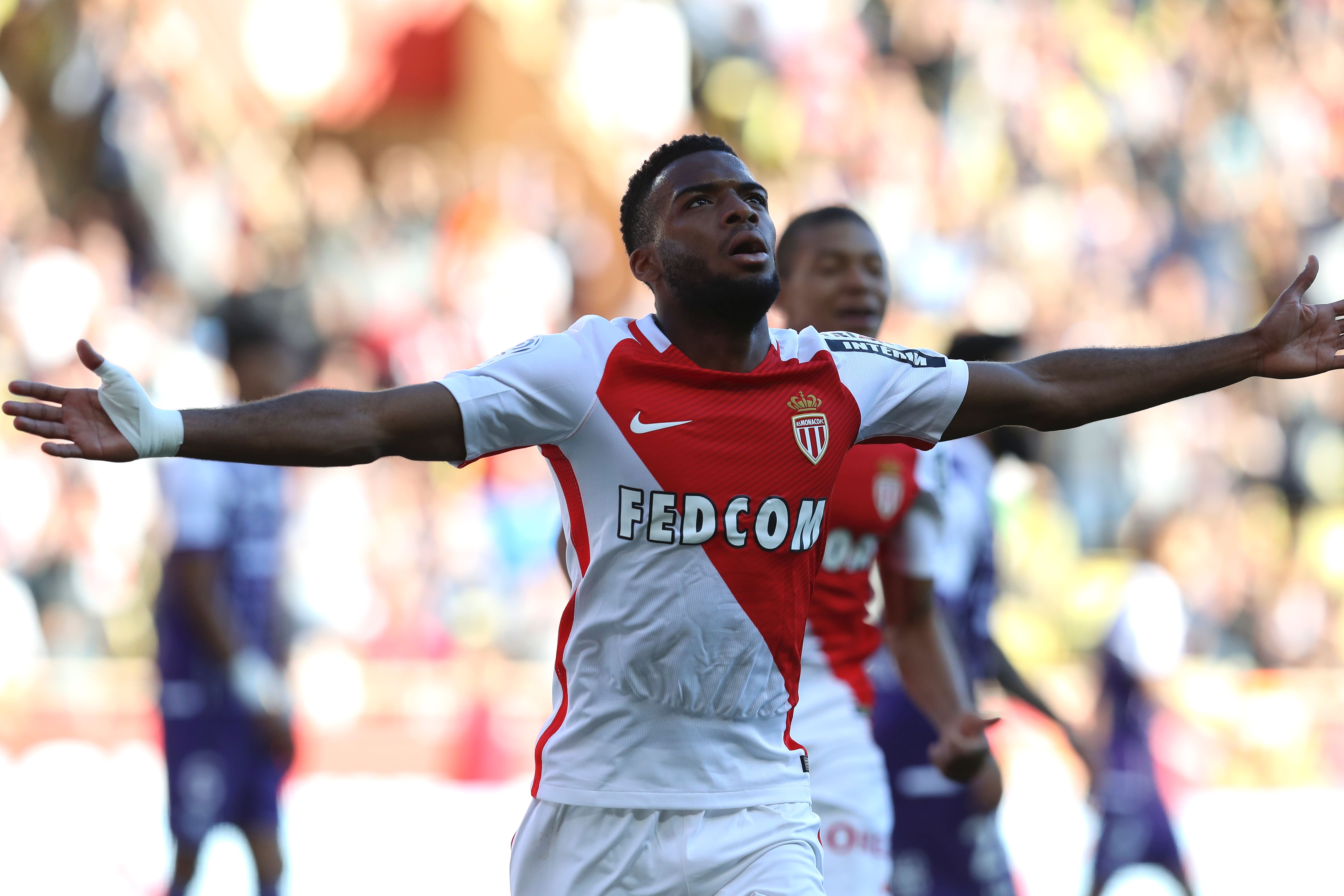 Monaco's French midfielder Thomas Lemar celebrates after scoring a goal during the French L1 football match Monaco (ASM) vs Toulouse (TFC) on April 29, 2017 at the "Louis II Stadium" in Monaco. / AFP PHOTO / VALERY HACHE        (Photo credit should read VALERY HACHE/AFP/Getty Images)
