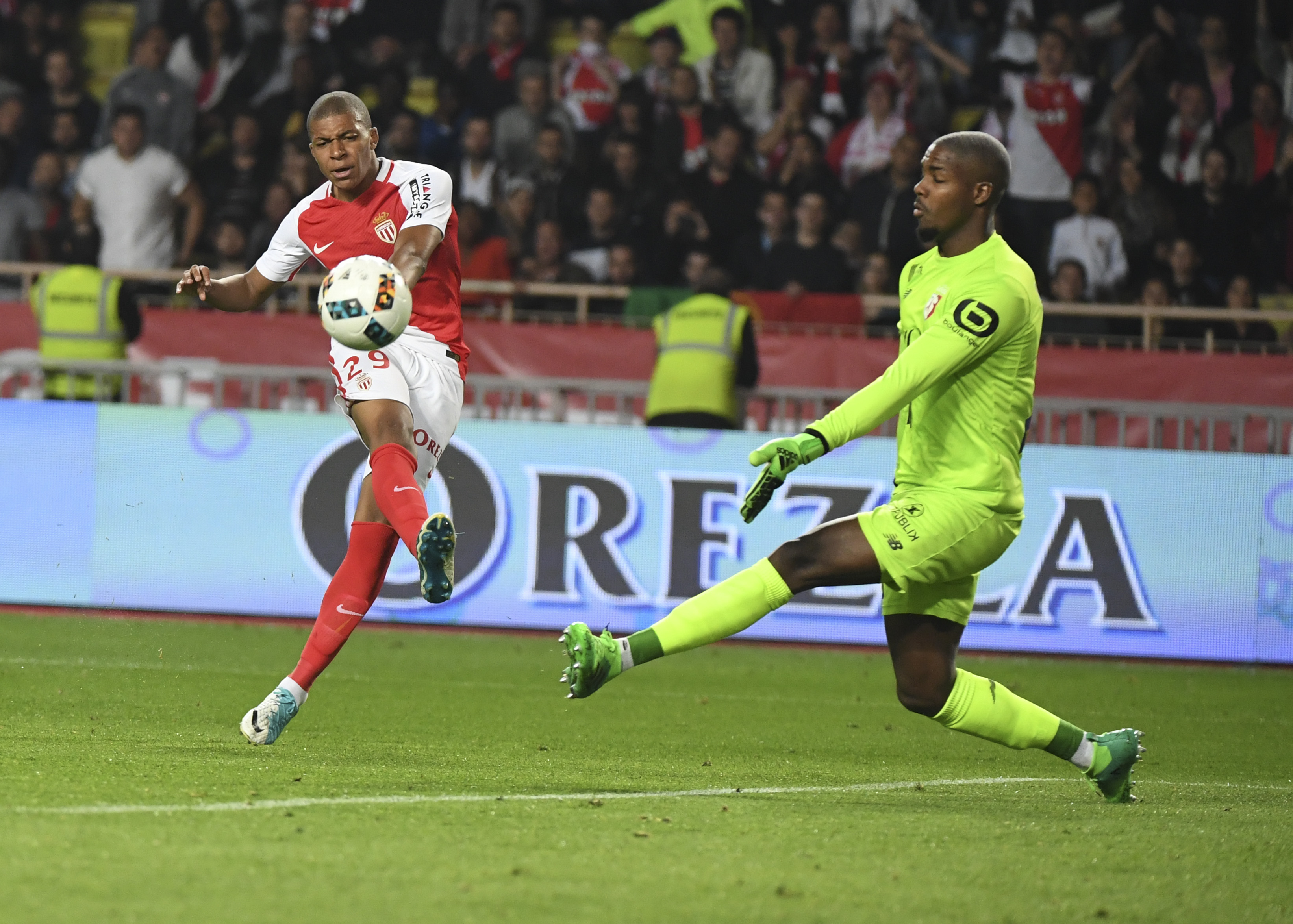 Monaco's French forward Kylian Mbappe Lottin kicks the ball  during the French L1 football match between Monaco (ASM) and Lille (LOSC) at the Louis II Stadium in Monaco on May 14,2017. / AFP PHOTO / Yann COATSALIOU        (Photo credit should read YANN COATSALIOU/AFP/Getty Images)