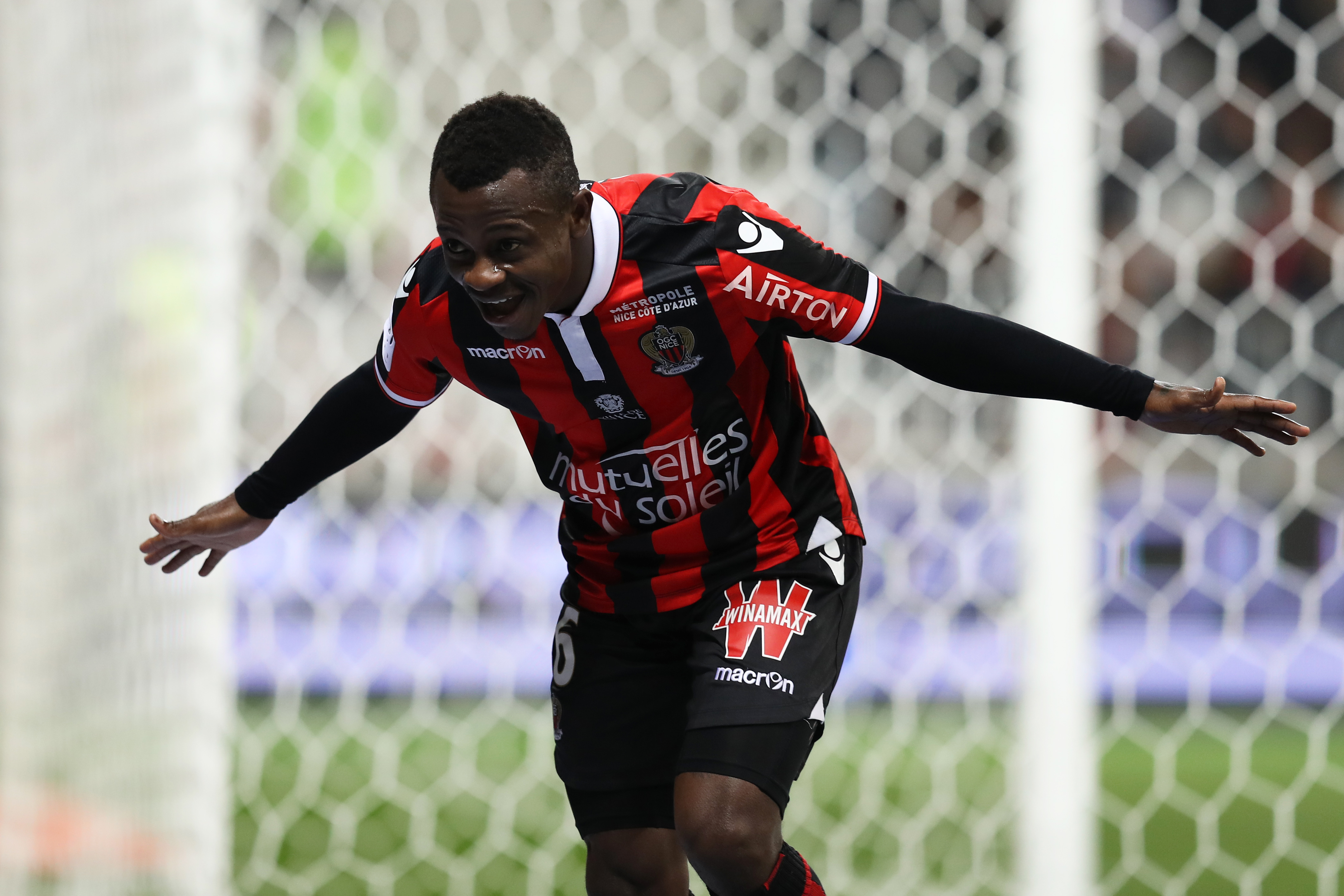 Nice's Ivorian midfielder Jean Michael Seri celebrates after scoring a goalduring the French L1 football match Nice (OGCN) vs Toulouse (TFC) on December 4, 2016 at the "Allianz Riviera" stadium in Nice, southeastern France.  / AFP / VALERY HACHE        (Photo credit should read VALERY HACHE/AFP/Getty Images)