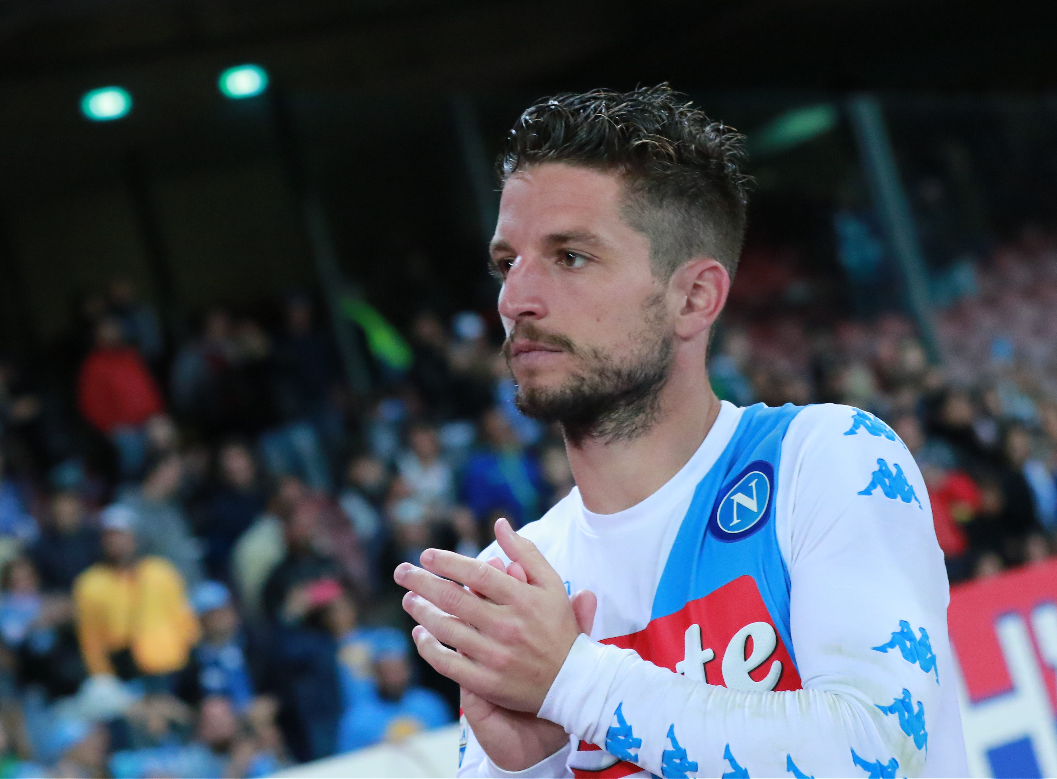 Napoli's Belgian forward Dries Mertens greets the fans at the end of the Italian Serie A football match SSC Napoli vs Fiorentina ACF on May 20, 2017 at the San Paolo Stadium in Naples. / AFP PHOTO / CARLO HERMANN        (Photo credit should read CARLO HERMANN/AFP/Getty Images)