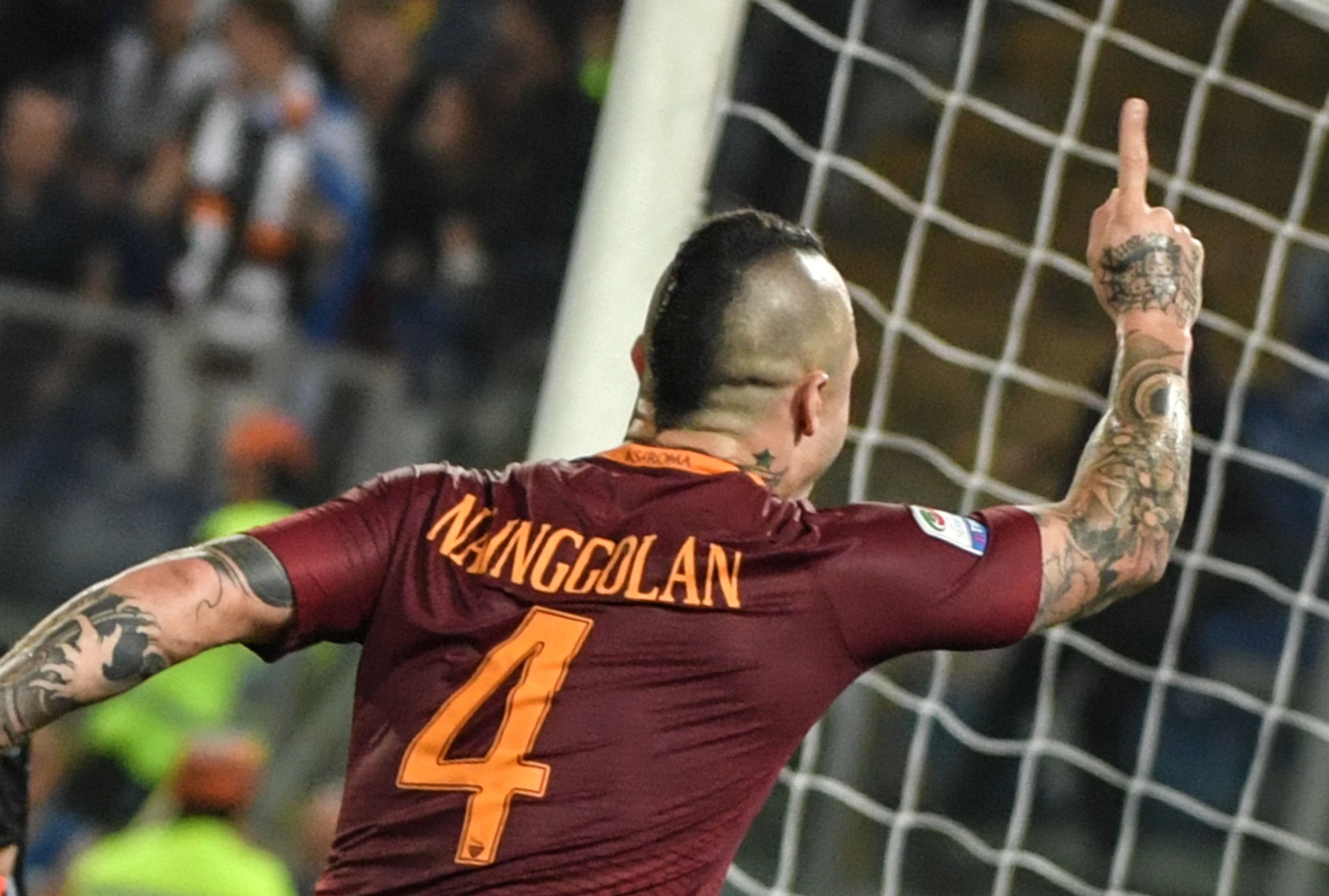 AS Roma's midfielder from Belgium Radja Nainggolan (R) celebrates after scoring against Juventus' goalkeeper from Italy Gianluigi Buffon during the Italian Serie A football match Roma vs Juventus, on May 14, 2017 at Rome's Olympic stadium. / AFP PHOTO / Andreas SOLARO        (Photo credit should read ANDREAS SOLARO/AFP/Getty Images)