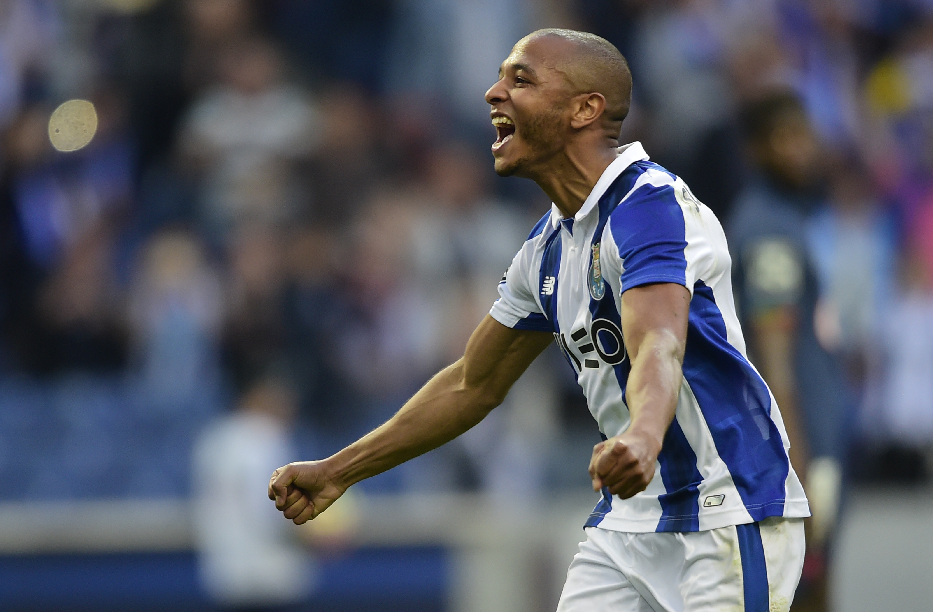 Porto's Algerian forward Yacine Brahimi celebrates after scoring a goal during the Portuguese league football match FC Porto vs Belenenses at the Dragao stadium in Porto on April 8, 2017. / AFP PHOTO / MIGUEL RIOPA        (Photo credit should read MIGUEL RIOPA/AFP/Getty Images)