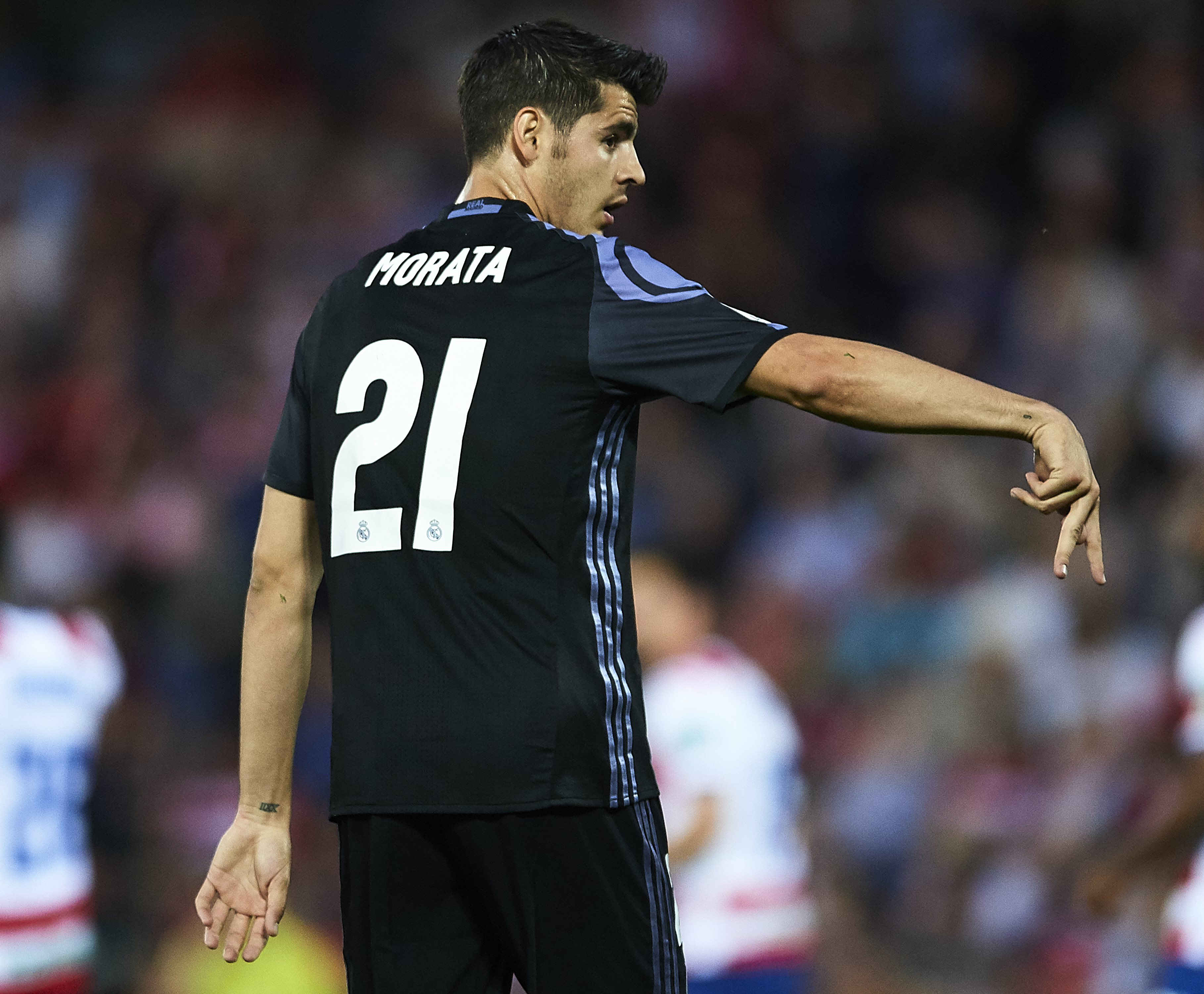 GRANADA, SPAIN - MAY 06:  Alvaro Morata of Real Madrid CF celebrates after scoring the second goal during the La Liga match between Granada CF v Real Madrid CF at Estadio Nuevo Los Carmenes on May 6, 2017 in Granada, Spain.  (Photo by Aitor Alcalde/Getty Images)