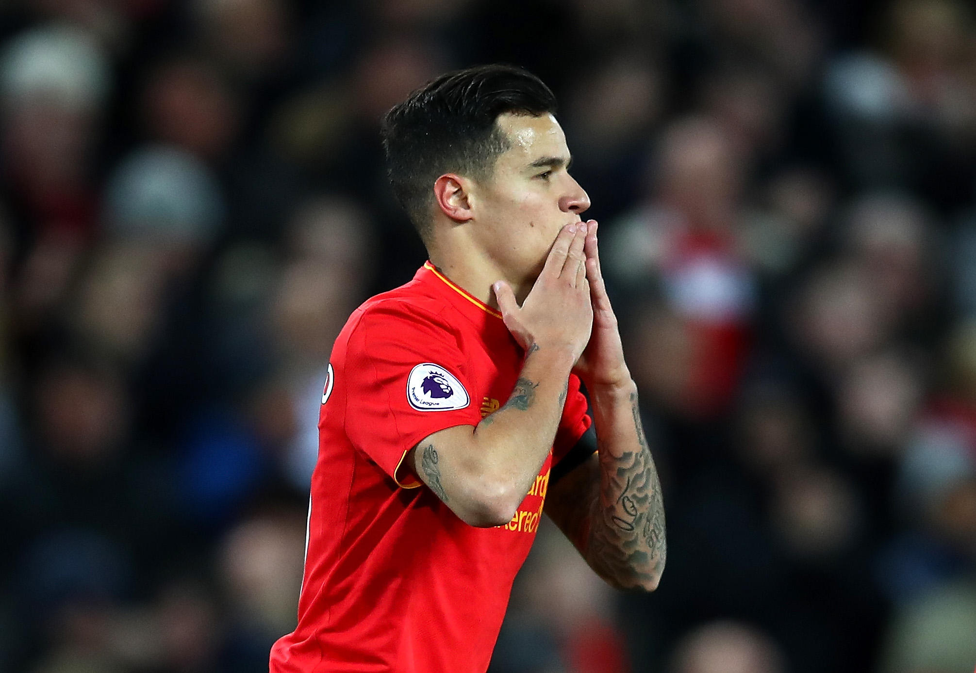LIVERPOOL, ENGLAND - APRIL 05:  Philippe Coutinho of Liverpool celebrates scoring his sides first goal during the Premier League match between Liverpool and AFC Bournemouth at Anfield on April 5, 2017 in Liverpool, England.  (Photo by Clive Brunskill/Getty Images)