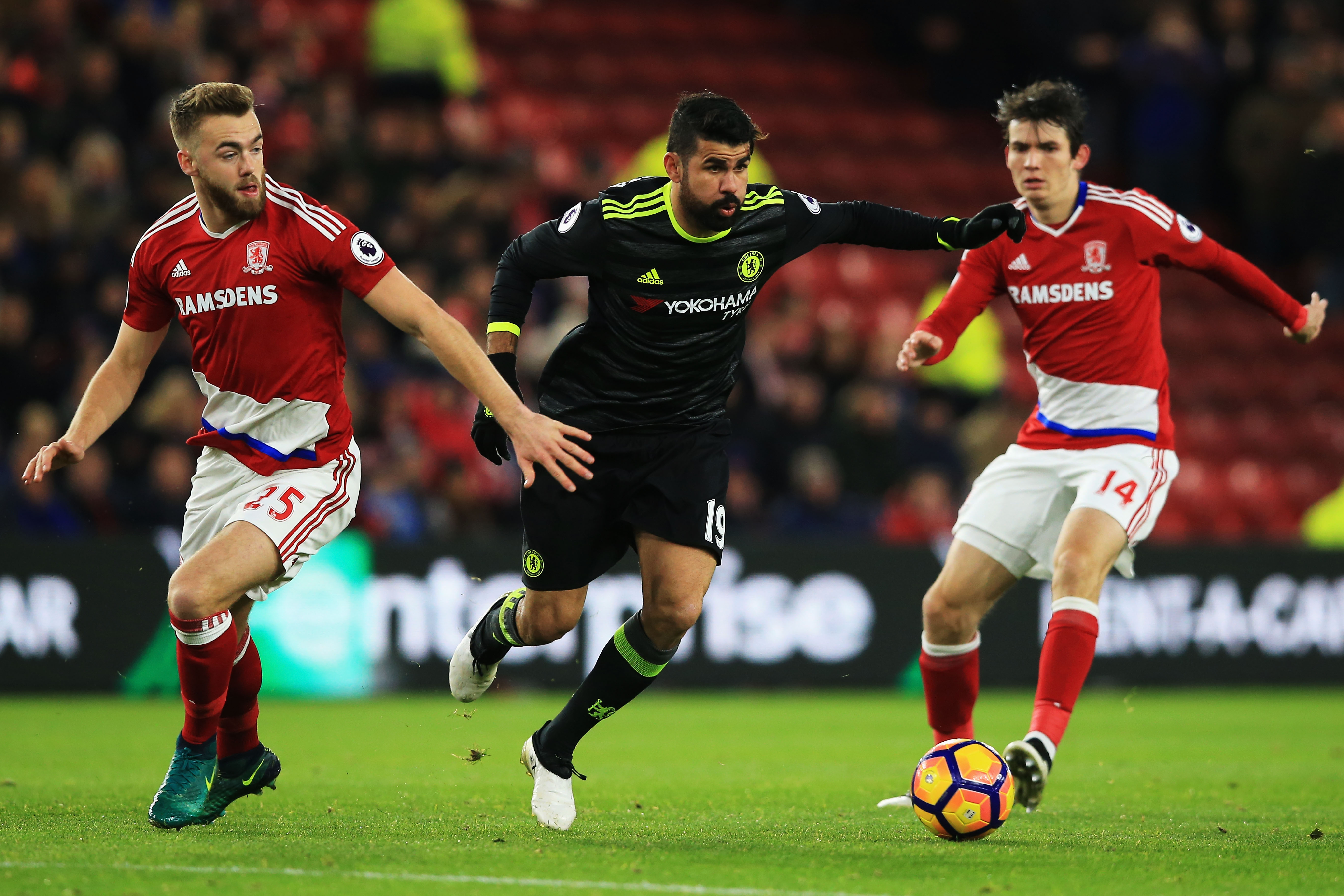 MIDDLESBROUGH, ENGLAND - NOVEMBER 20:  Diego Costa of Chelsea is closed down by Calum Chambers (L) and Marten de Roon of Middlesbrough during the Premier League match between Middlesbrough and Chelsea at Riverside Stadium on November 20, 2016 in Middlesbrough, England.  (Photo by Jan Kruger/Getty Images)