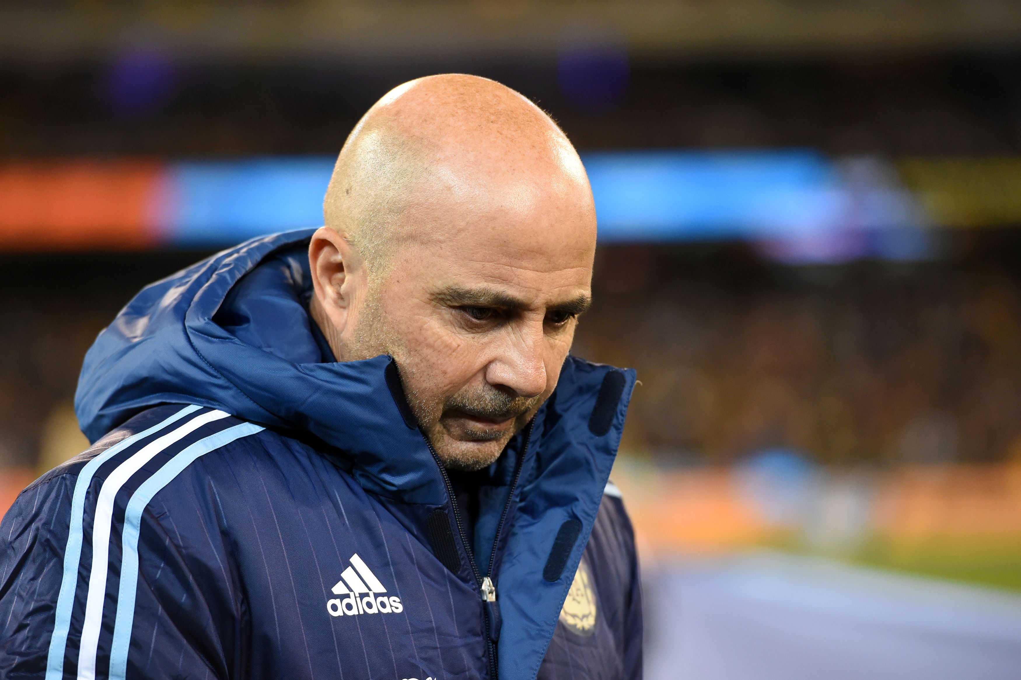 Argentina's football manager Jorge Sampaoli walks off the field before the friendly international football match between Brazil and Argentina at the MCG in Melbourne on June 9, 2017. / AFP PHOTO / SAEED KHAN / IMAGE RESTRICTED TO EDITORIAL USE - STRICTLY NO COMMERCIAL USE        (Photo credit should read SAEED KHAN/AFP/Getty Images)