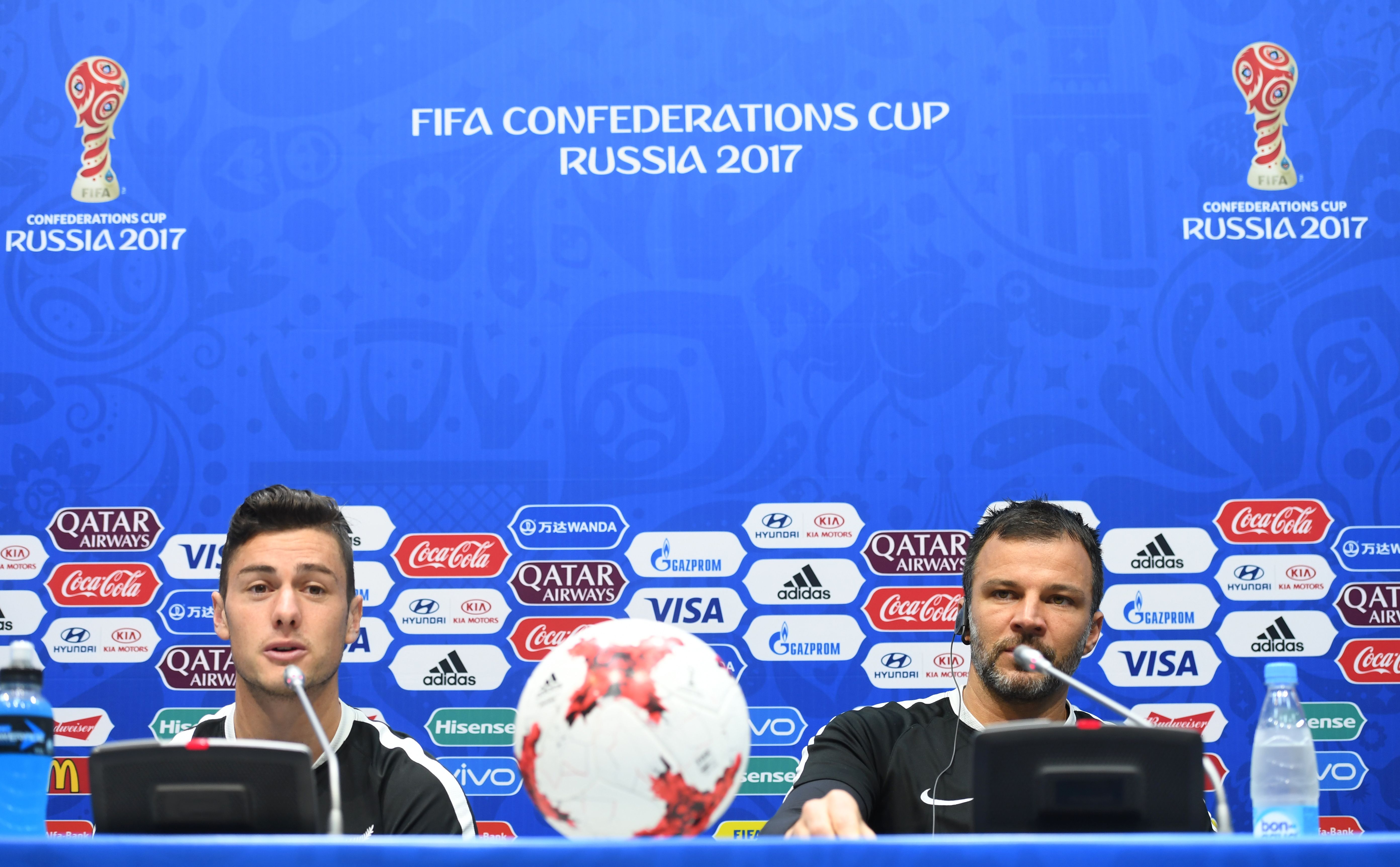 New Zealand´s head coach Anthony Hudson (R) and New Zealand´s midfielder Marco Royas give a press conference the day before their group A match against Mexico in the Russia 2017 Confederation Cup football tournament at the Fisht Stadium in Sotchi on June 20, 2017. / AFP PHOTO / PATRIK STOLLARZ        (Photo credit should read PATRIK STOLLARZ/AFP/Getty Images)