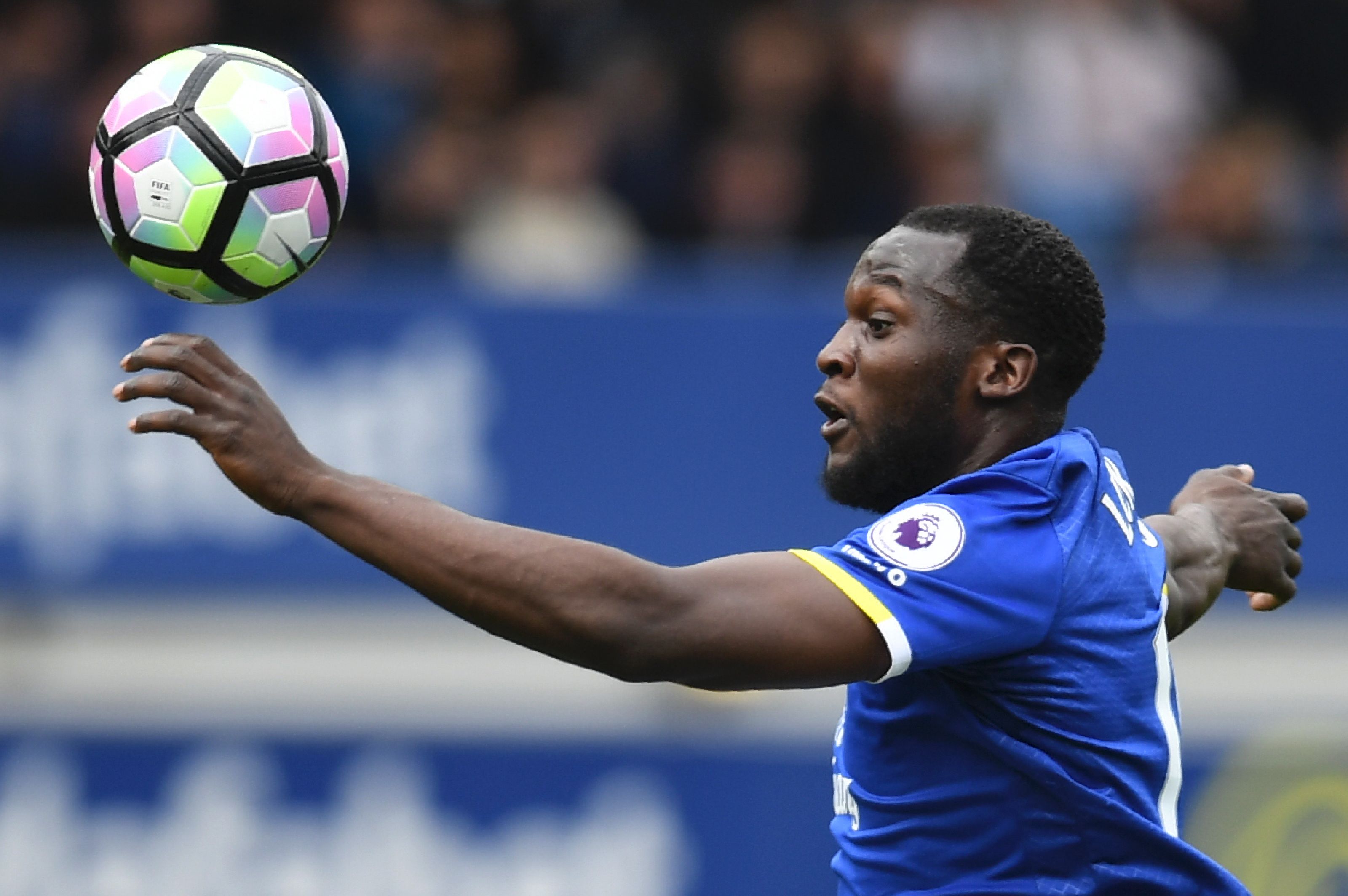 Everton's Belgian striker Romelu Lukaku controls the ball during the English Premier League football match between Everton and Chelsea at Goodison Park in Liverpool, north west England on April 30, 2017. / AFP PHOTO / Paul ELLIS / RESTRICTED TO EDITORIAL USE. No use with unauthorized audio, video, data, fixture lists, club/league logos or 'live' services. Online in-match use limited to 75 images, no video emulation. No use in betting, games or single club/league/player publications.  /         (Photo credit should read PAUL ELLIS/AFP/Getty Images)