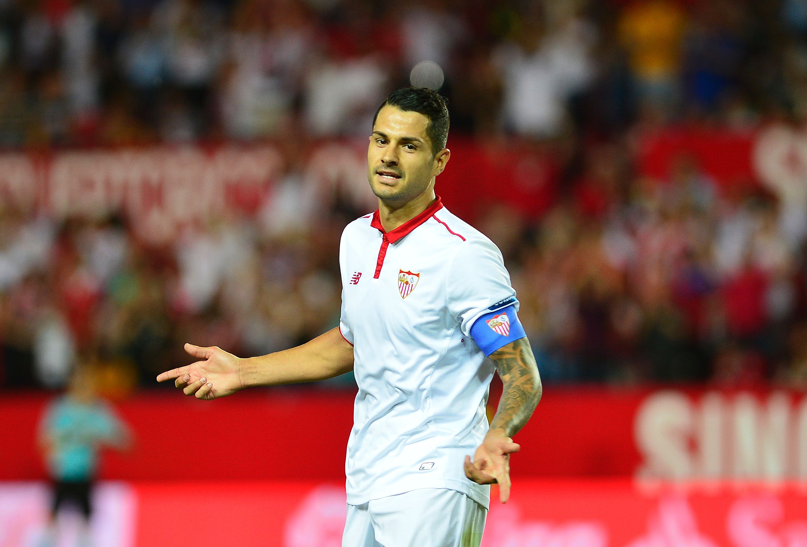 Sevilla's midfielder Vitolo celebrates after scoring a goal during the Spanish league football match Sevilla FC vs CA Osasuna at the Ramon Sanchez Pizjuan stadium in Sevilla on May 20, 2017. / AFP PHOTO / CRISTINA QUICLER        (Photo credit should read CRISTINA QUICLER/AFP/Getty Images)