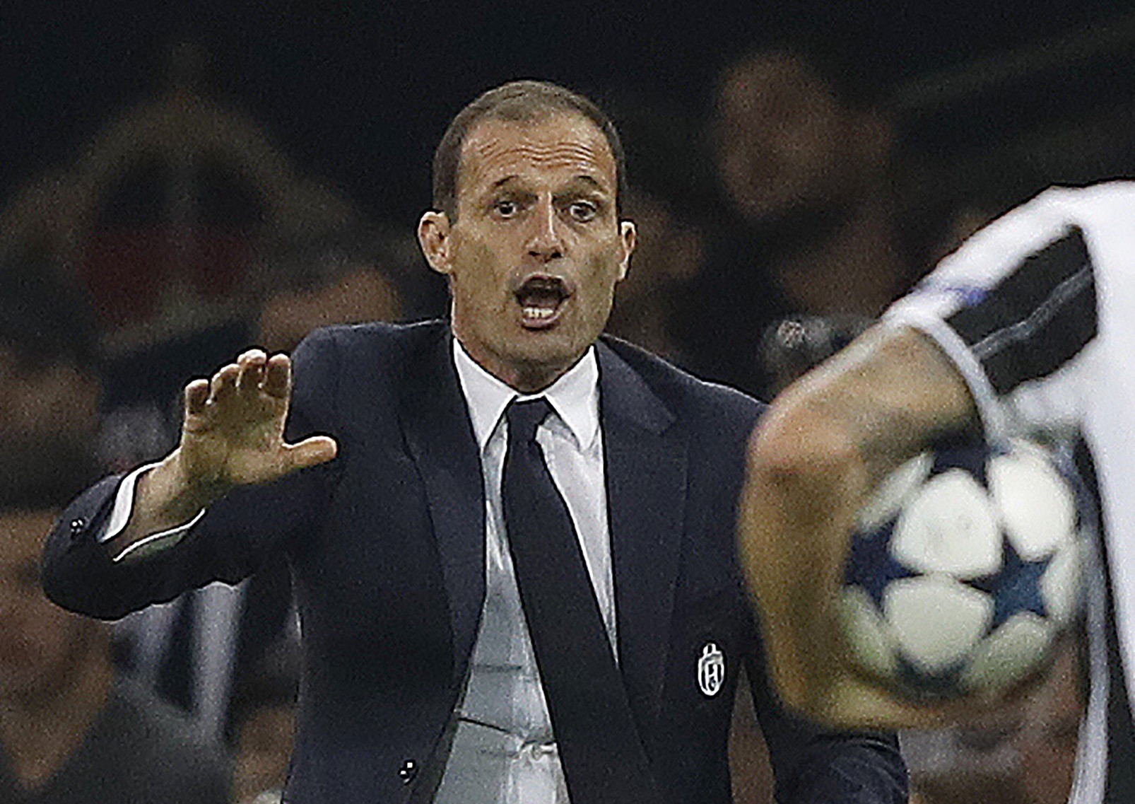 Juventus' manager Massimiliano Allegri (L) gestures to Juventus' Italian defender Leonardo Bonucci during the UEFA Champions League final football match between Juventus and Real Madrid at The Principality Stadium in Cardiff, south Wales, on June 3, 2017. / AFP PHOTO / Adrian DENNIS        (Photo credit should read ADRIAN DENNIS/AFP/Getty Images)