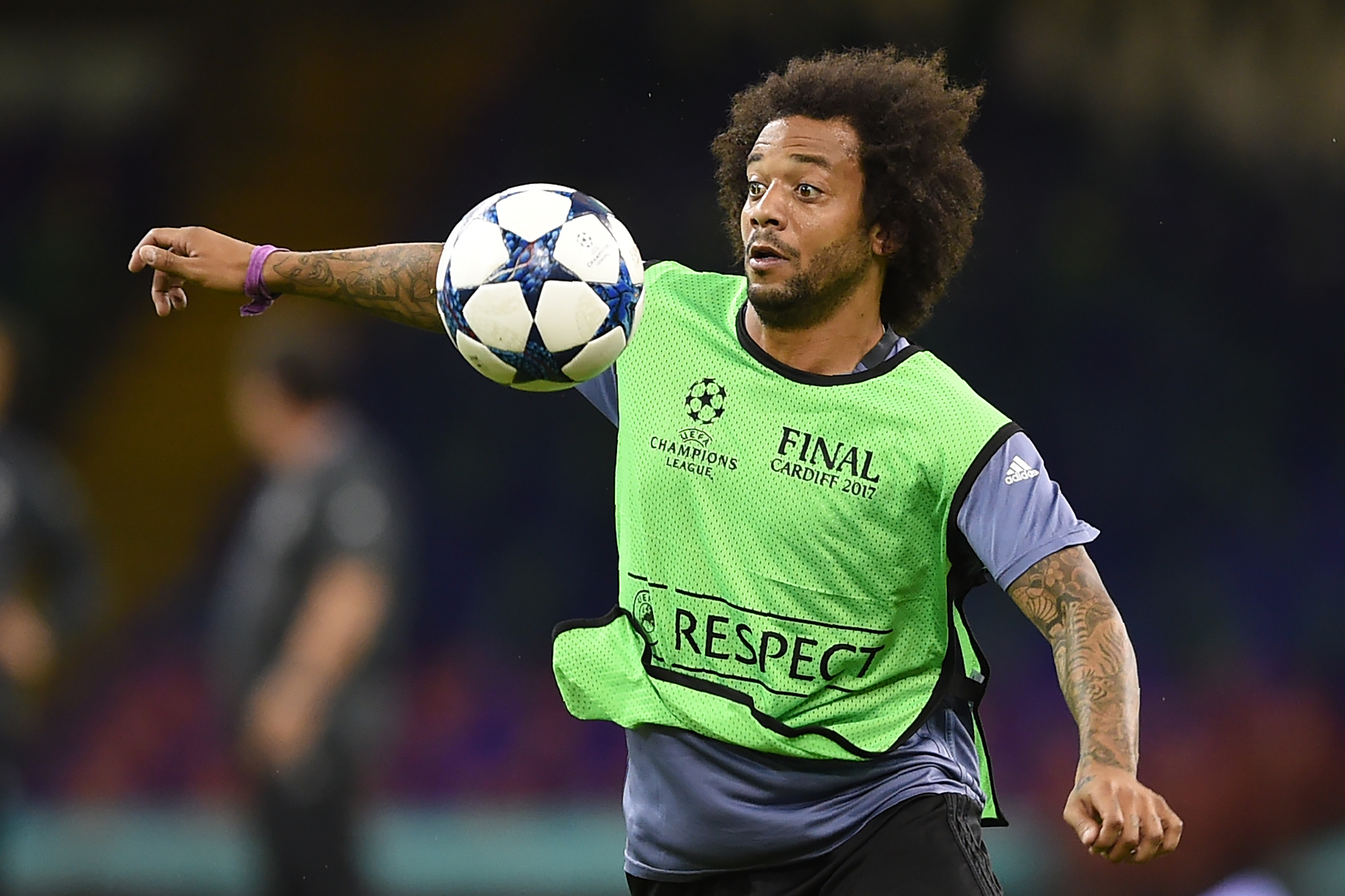Real Madrid's Brazilian defender Marcelo takes part in a training session at The Principality Stadium in Cardiff, south Wales, on June 2, 2017, on the eve of the UEFA Champions League final football match between Juventus and Real Madrid. / AFP PHOTO / Filippo MONTEFORTE        (Photo credit should read FILIPPO MONTEFORTE/AFP/Getty Images)