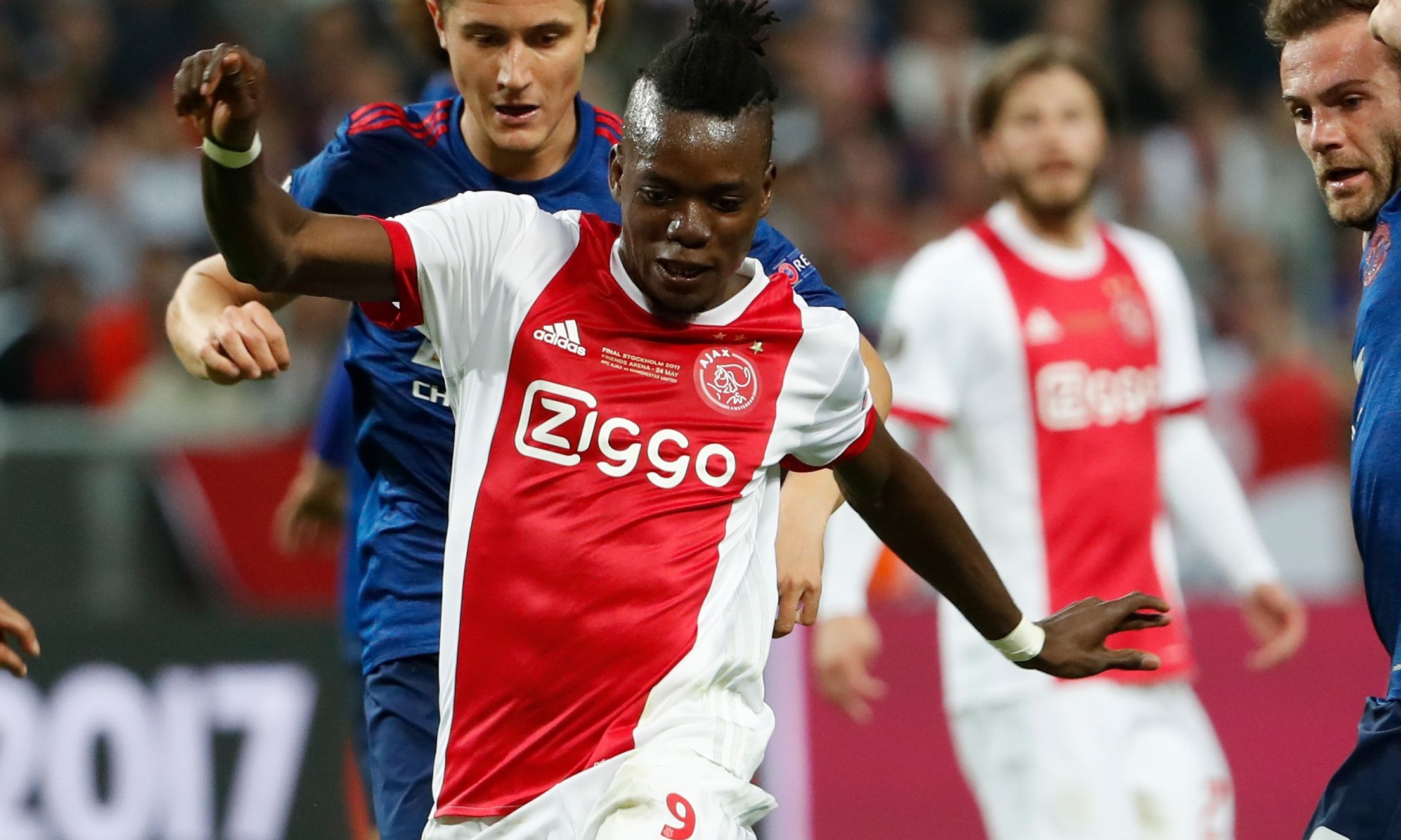 Ajax Burkinabe forward Bertrand Traoré (C) gets past Manchester United's Spanish midfielder Juan Mata (R) and Manchester United's Spanish midfielder Ander Herrera  during the UEFA Europa League final football match Ajax Amsterdam v Manchester United on May 24, 2017 at the Friends Arena in Solna outside Stockholm. / AFP PHOTO / Odd ANDERSEN        (Photo credit should read ODD ANDERSEN/AFP/Getty Images)